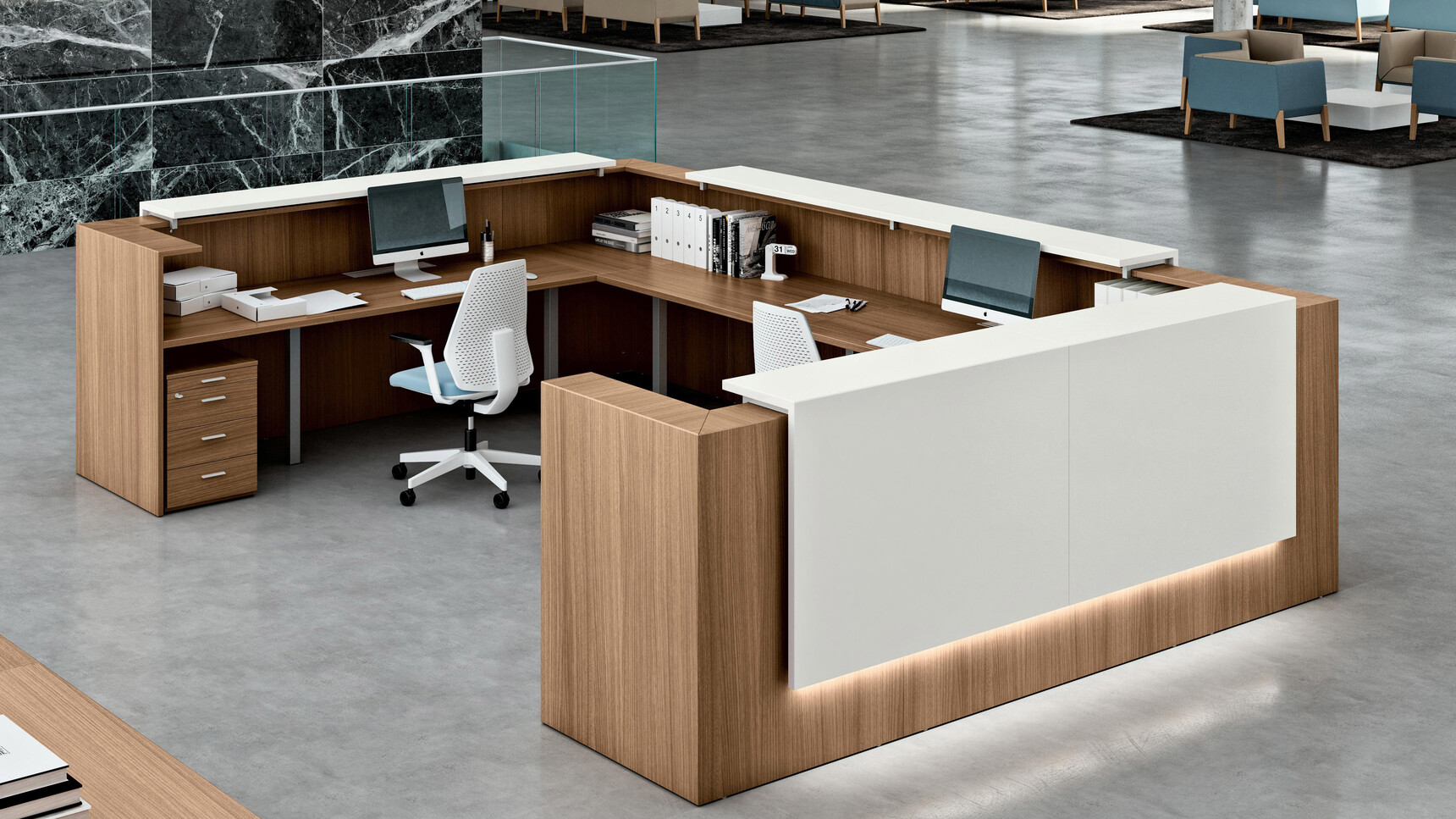 Quadrifoglio Z2 Reception Counter With Wood Finish And Three White Side Panes And Two Quadrifoglio Chairs In Blue Upholstery And White Backrest Frame And Arms And White Base On Castors In Reception Area