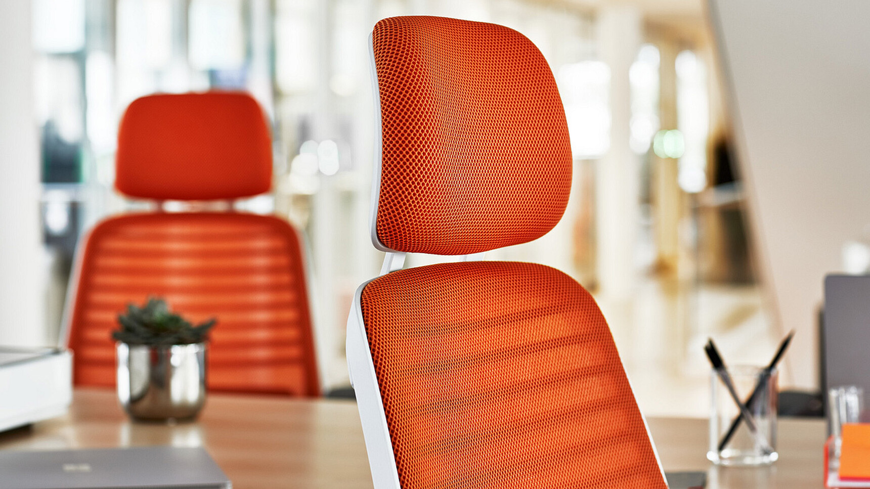 Two Steelcase Series One With Headrest Office Chairs In Orange Upholstery And White Frame Detail Image