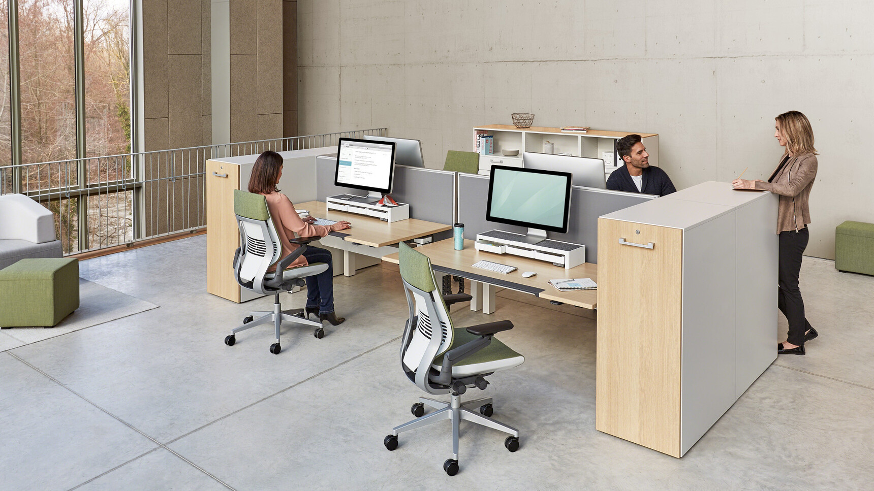 Two Steelcase Ology Height Adjustable Bench Desks With Simple Touch And Wood Table Tops With Three Wrapped Back Gestures With Headrests In Green Upholstery At Desks