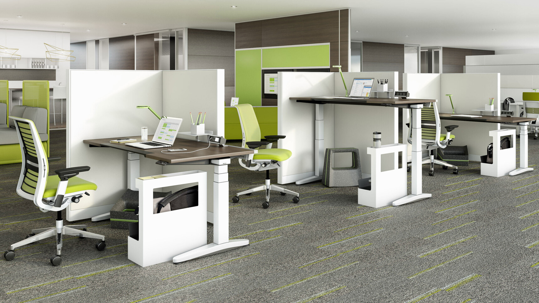 Three Steelcase Ology Height Adjustable Desks With Simple Touch With Wood Table Tops and White Legs And Four Think Chairs In Green Upholstery At Desks