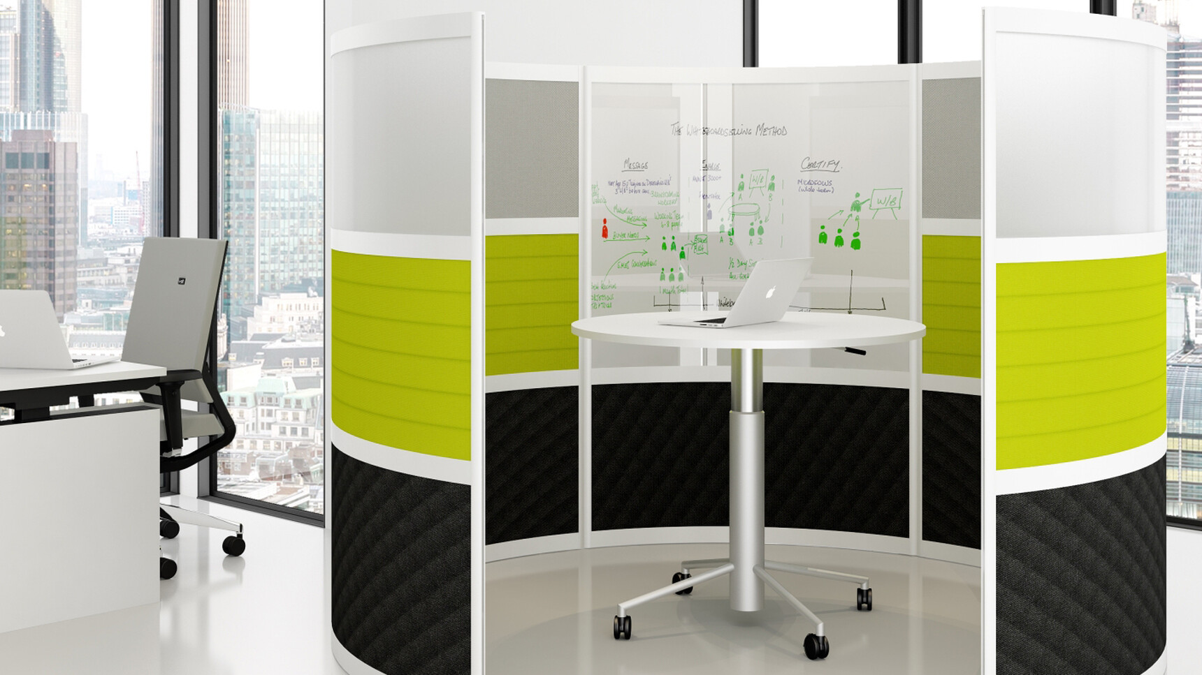 Elite Mobile Sit and Stand Meeting Table With White Table Top Finish And Silver Base Finish In A Booth With A Elite Chair And Desk In Office Environment