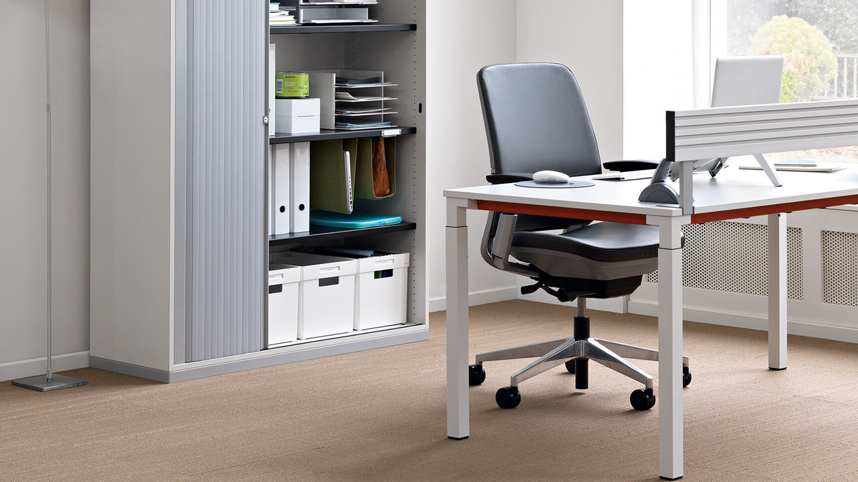 Steelcase Kalidro Fixed Height Desk With White Finish And Chair At Desk In Office Setting