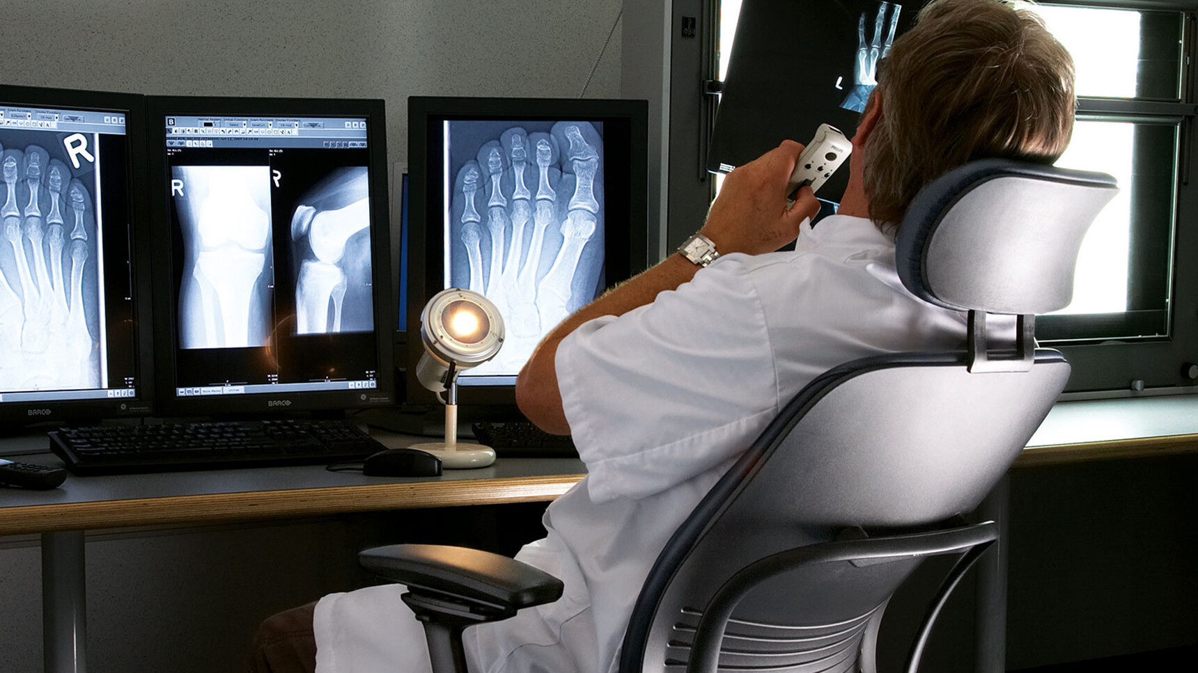 Steelcase Leap V2 Office Chair With Headrest In Use By A Doctor Detail Image