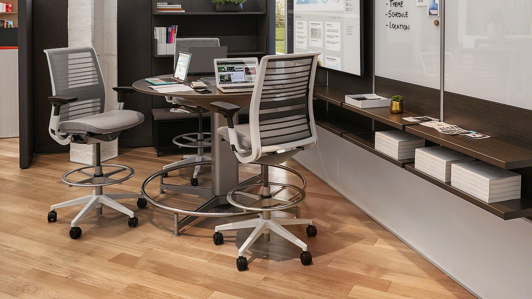 Steelcase Think 3D Knit Back Draughtsman Office Chairs At Desk In Grey Upholstery In Office Setting
