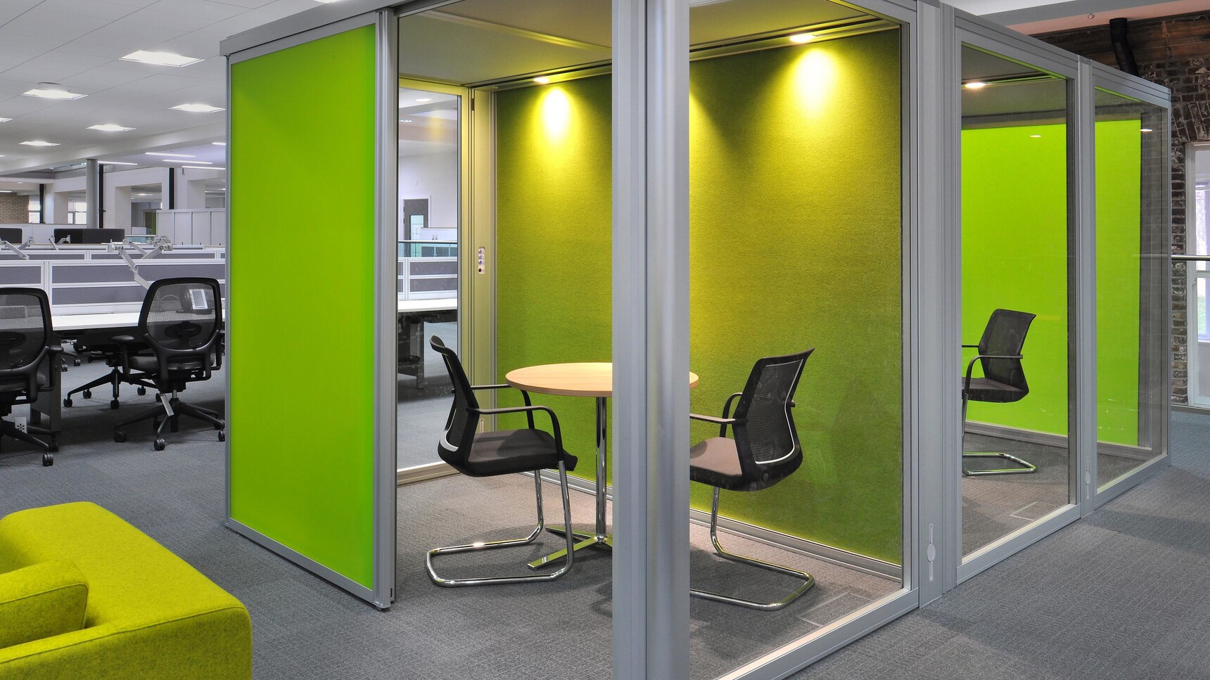 Orangebox Workday Cantilever Armchairs In Black Upholstery With Polished Base At Meeting Table In Meeting Room