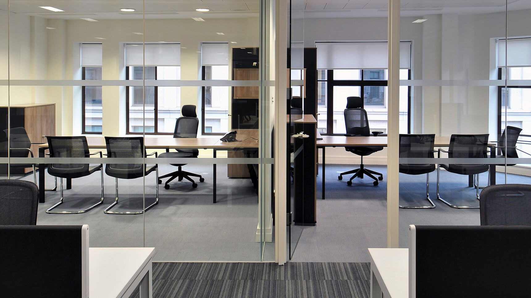 Orangebox Workday Cantilever Armchairs With Polished Base in Office Setting