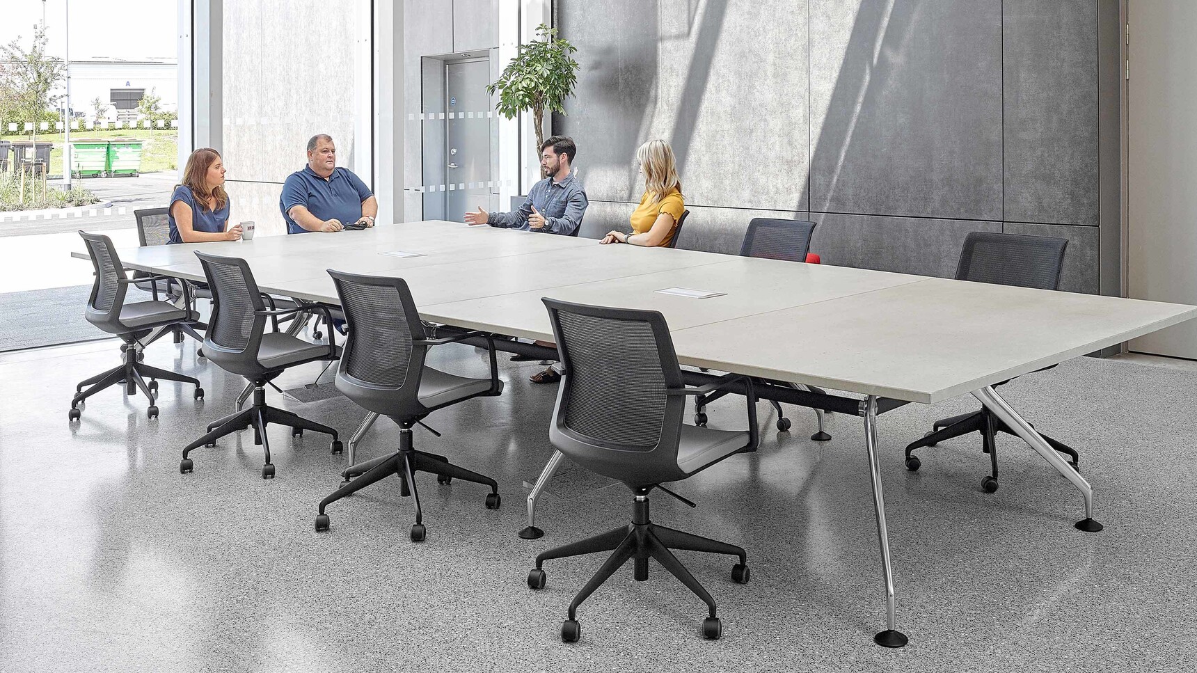 Orangebox Workday Lite Work Armchairs At Conference Table In Use With By Four People