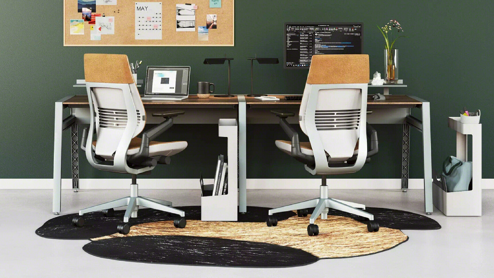 Two Steelcase Gesture Wrapped Back Office Chairs With Brown Upholstery With Light Light Frames At Desks In Office Settings