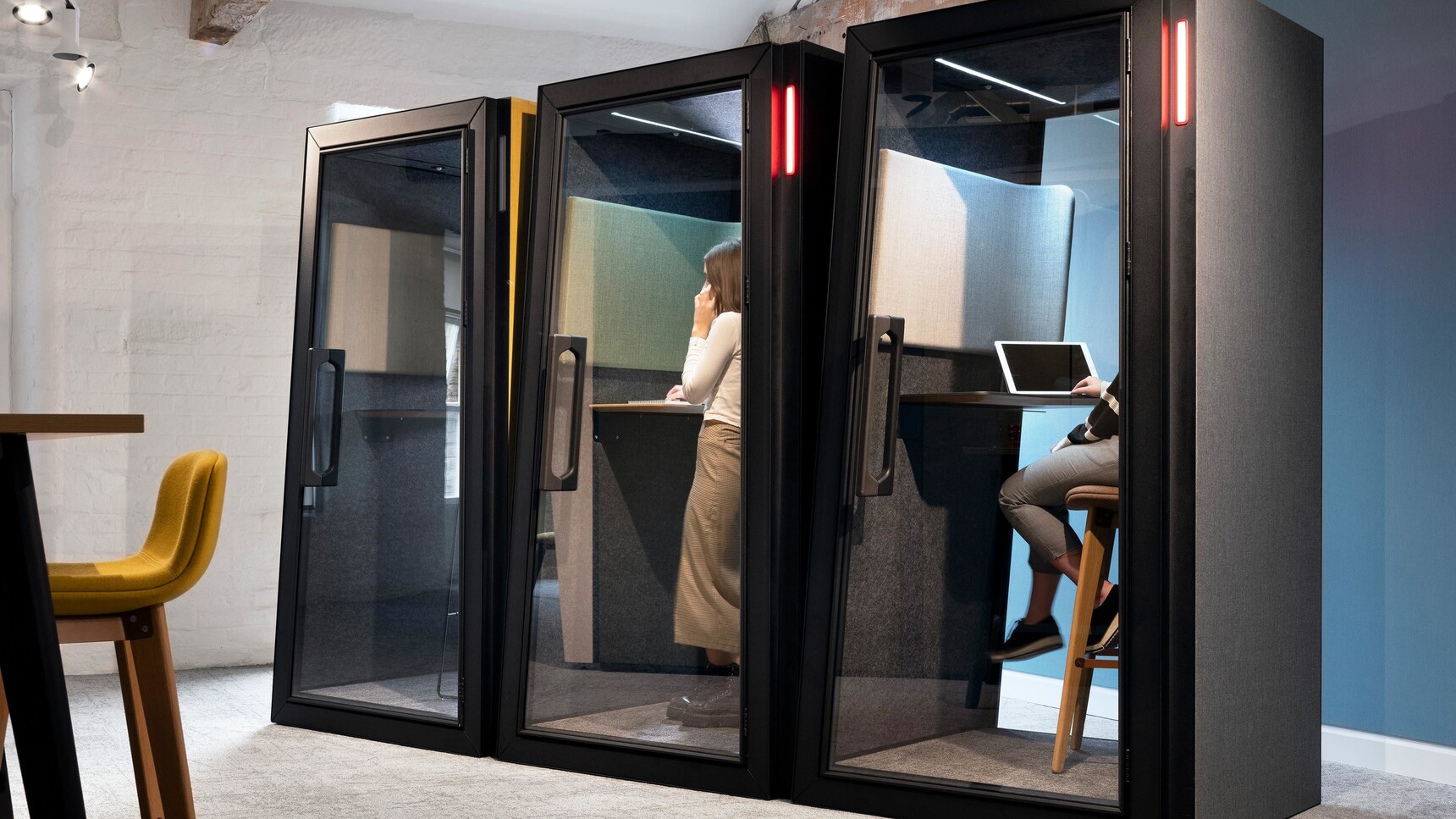 Three Orangebox On The QT Personal Pods In Black Finish In Office Environment