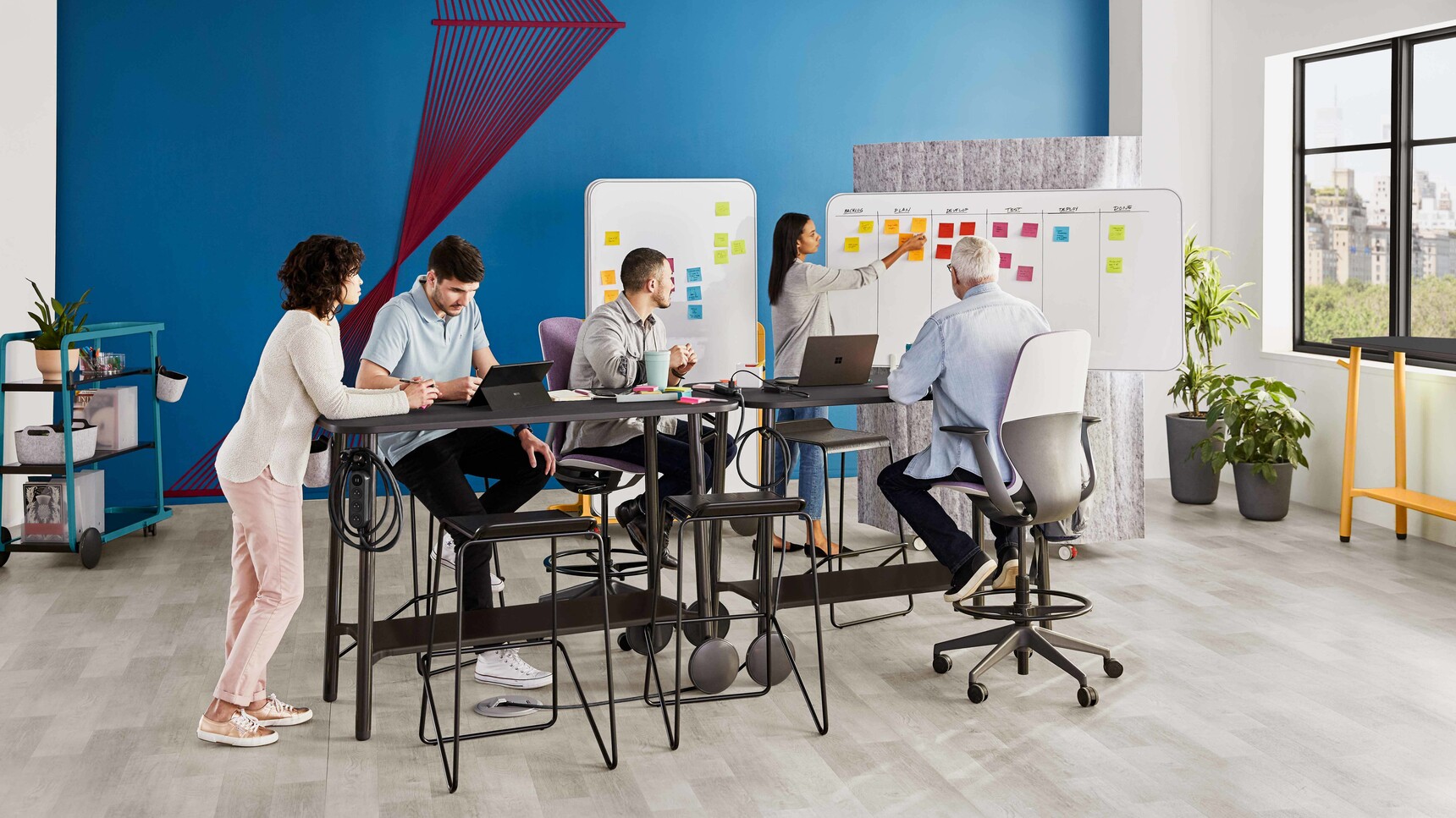 Steelcase Flex Whiteboard Solutions With Flex Tables In Use By Various People