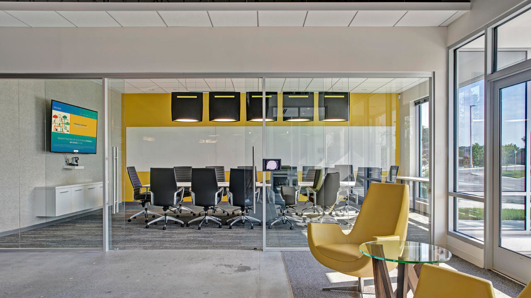 Five BuzziBell LED Lights In Black BuzziFelt In Office Setting