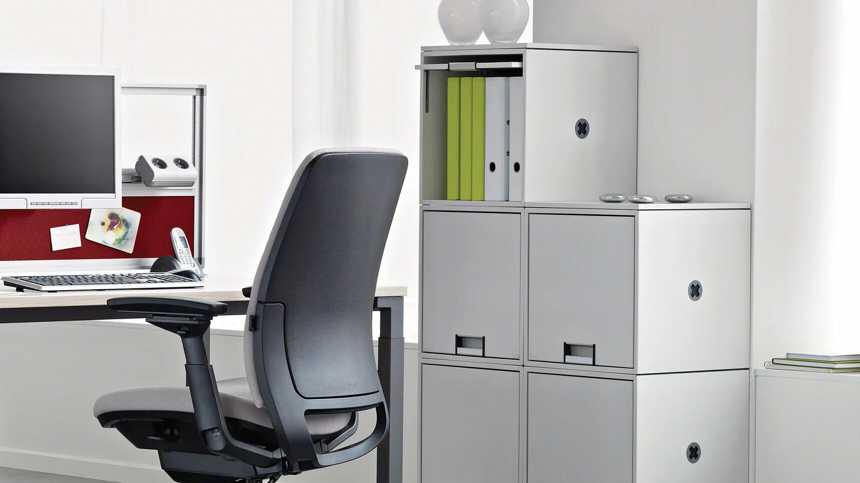 Steelcase Amia Office Task Chair At Table In Office Setting