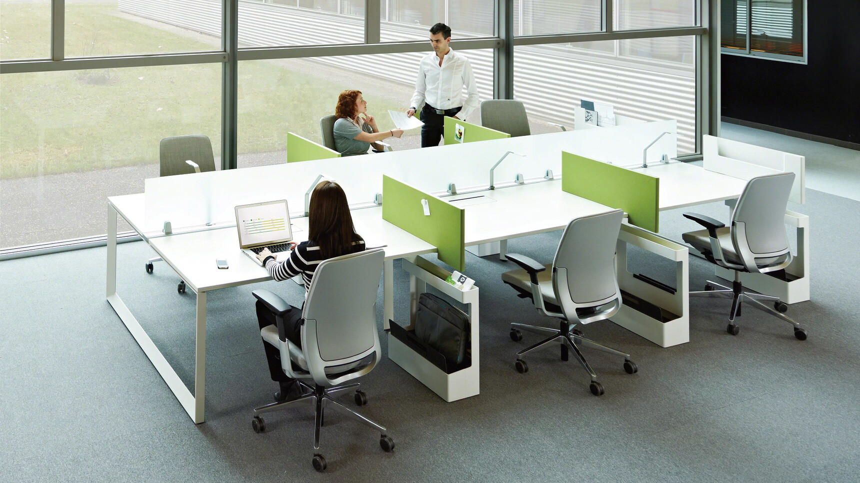 Six Steelcase Amia Platinum Office Task Chairs At White Bench Desk In Office Setting