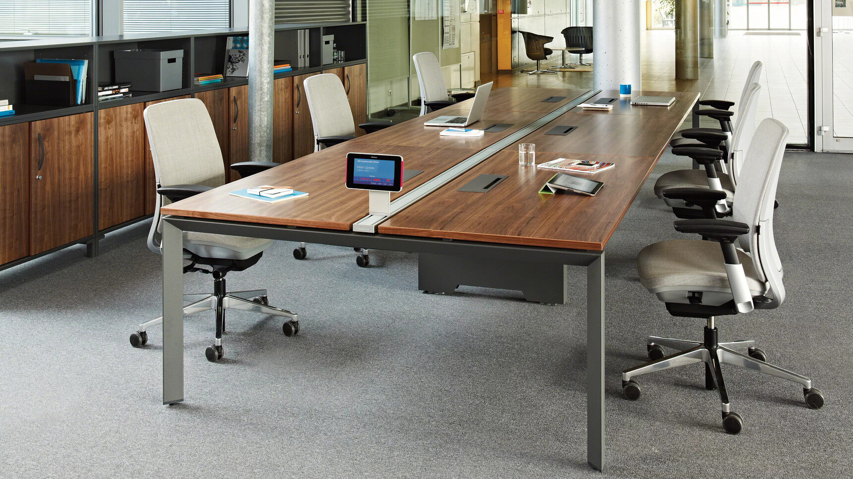 Six Steelcase Amia Platinum Office Task Chairs At Wood Meeting Table In Office Setting