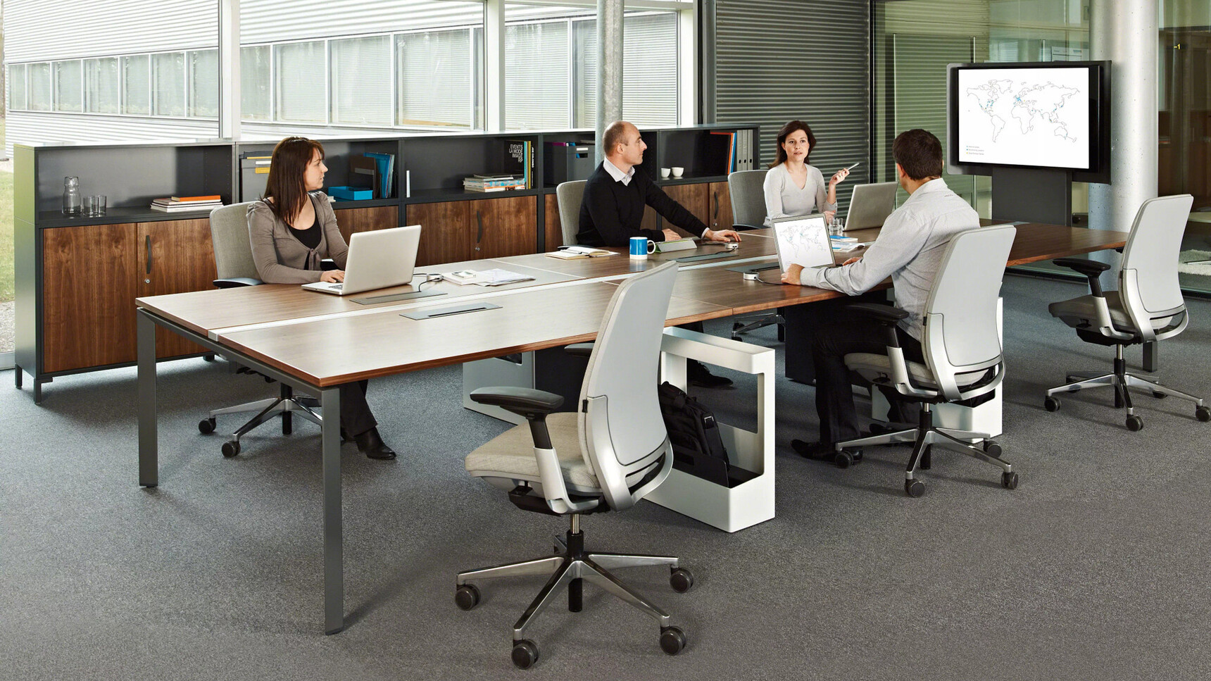 Six Steelcase Amia Platinum Office Task Chairs At Table In Office Environment