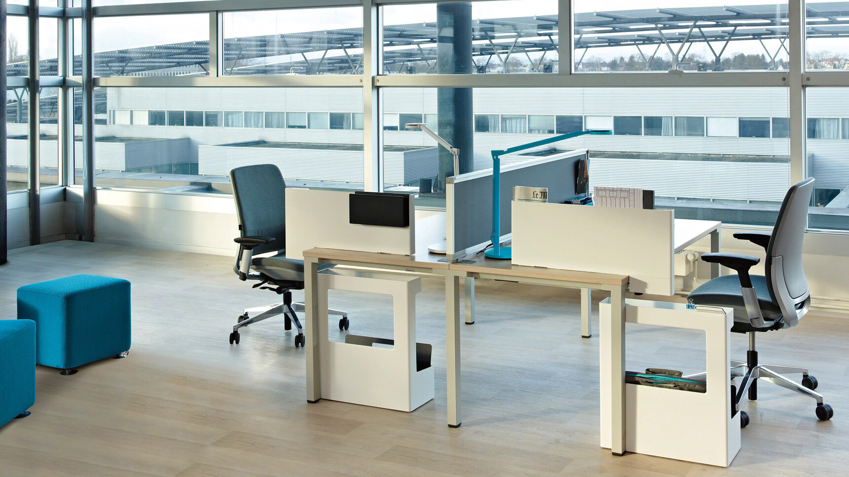 Two Steelcase Amia Platinum Office Task Chairs At Desks In Office Setting