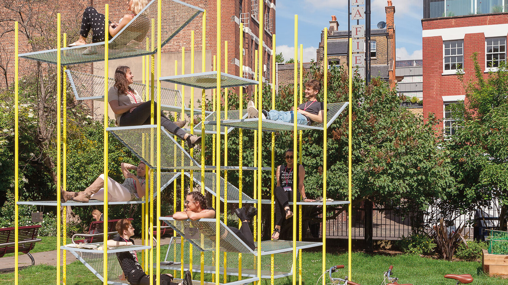 Buzzi Space BuzziJungle Tower High In Yellow Finish Detail Image In Use By People Outside