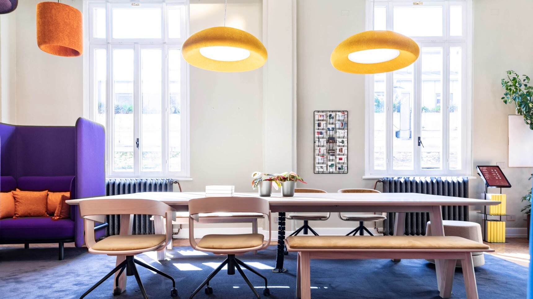 Two Buzzi Space BuzziDome LED Light With Yellow Upholstery In Office Setting