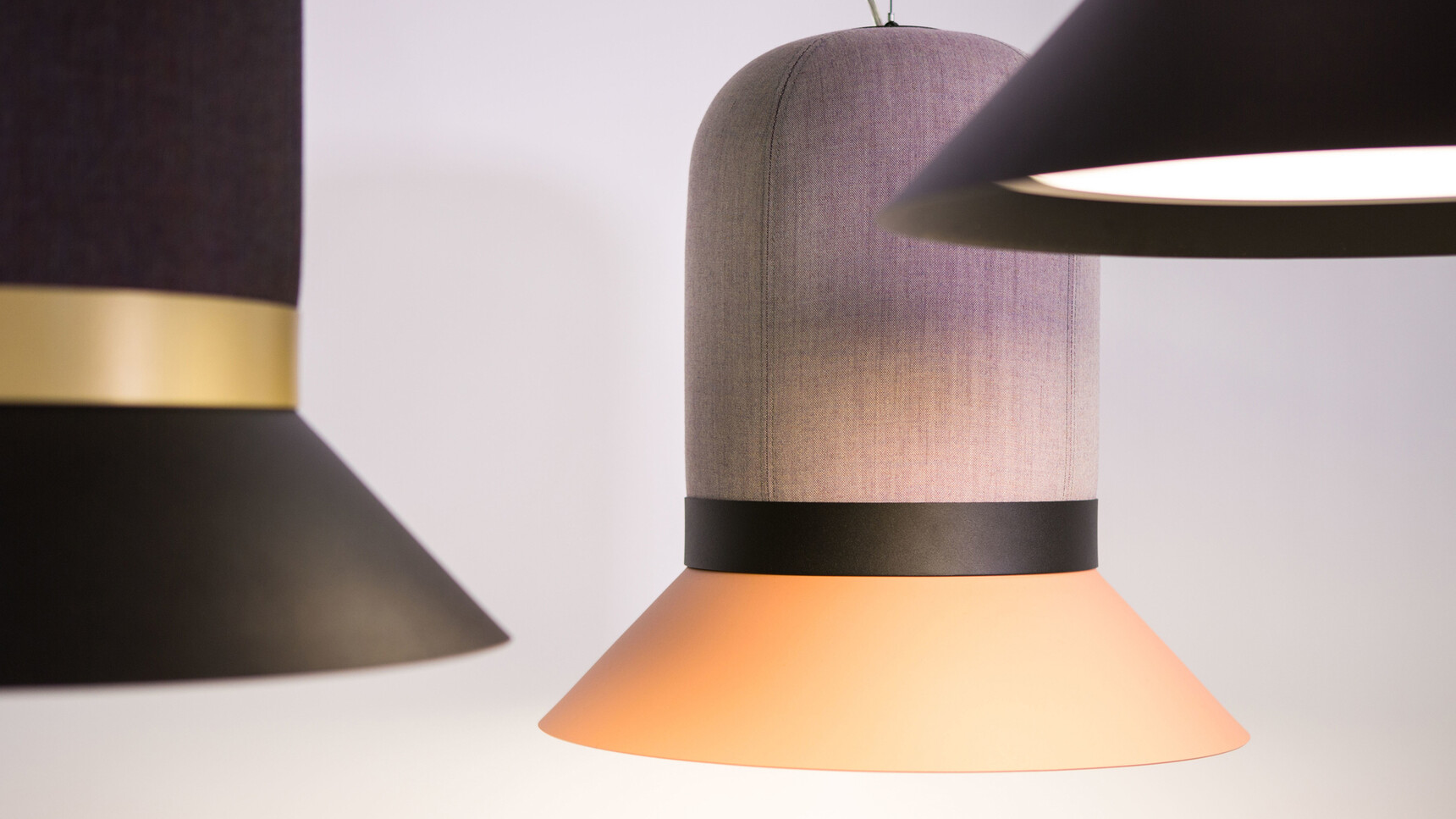 Buzzi Space BuzziHat Light Large With Purple Upholstery With Black Ring And Orange Shade With BuzziHat With Black Upholstery And Golden Ring And Black Shade Detail Image