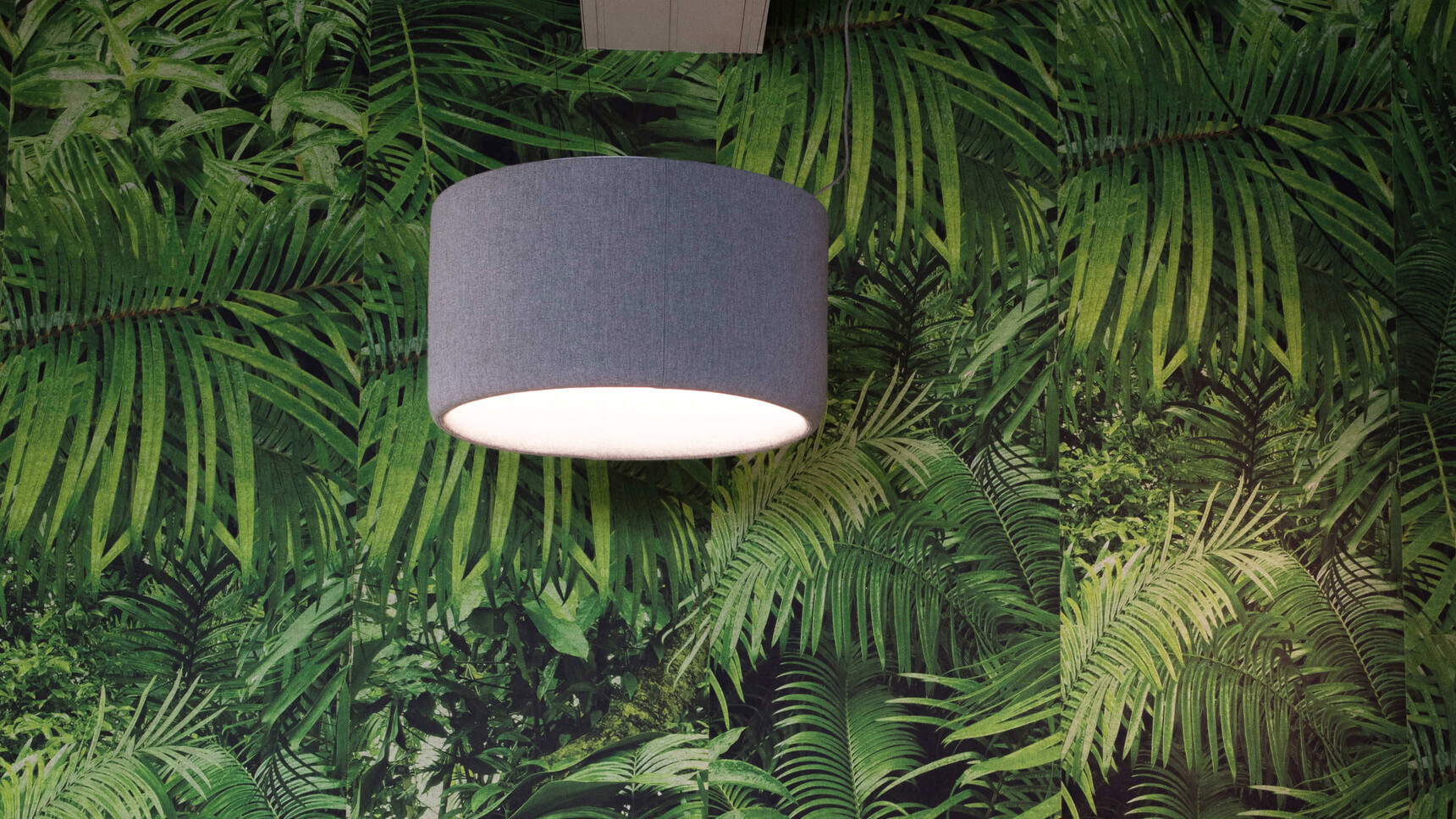 Buzzi Space BuzziJet Light With Grey Finish Detail Image With Tropical Background