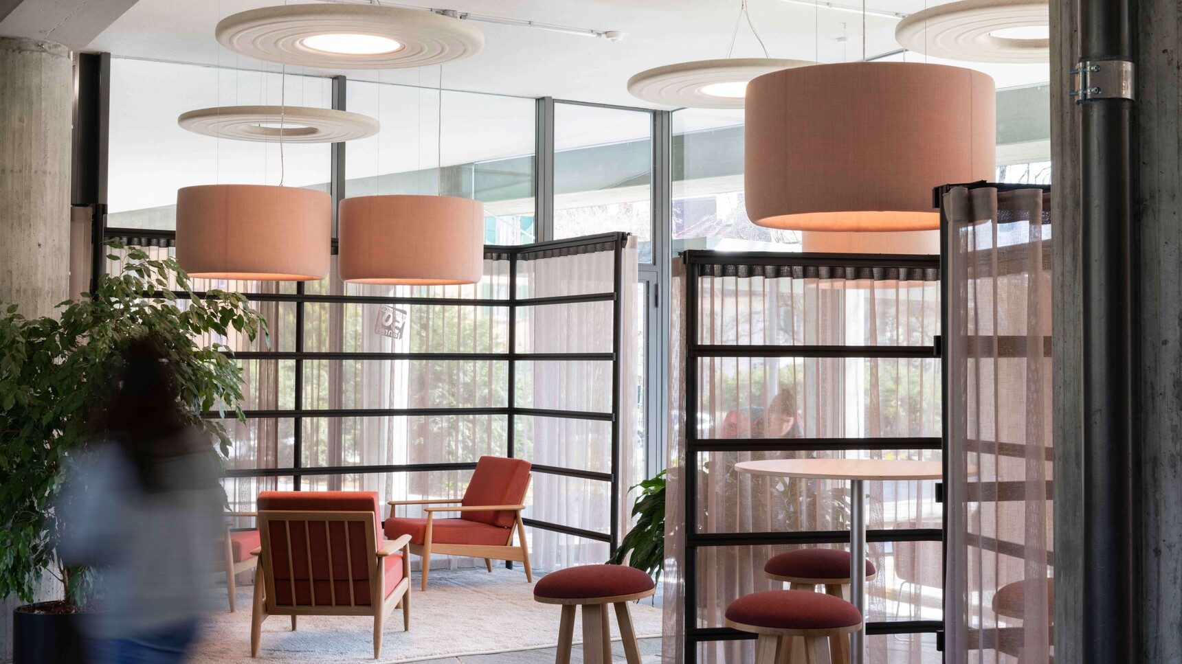 Buzzi Space BuzziJet Lights With Light Pink Upholstery In Office Setting