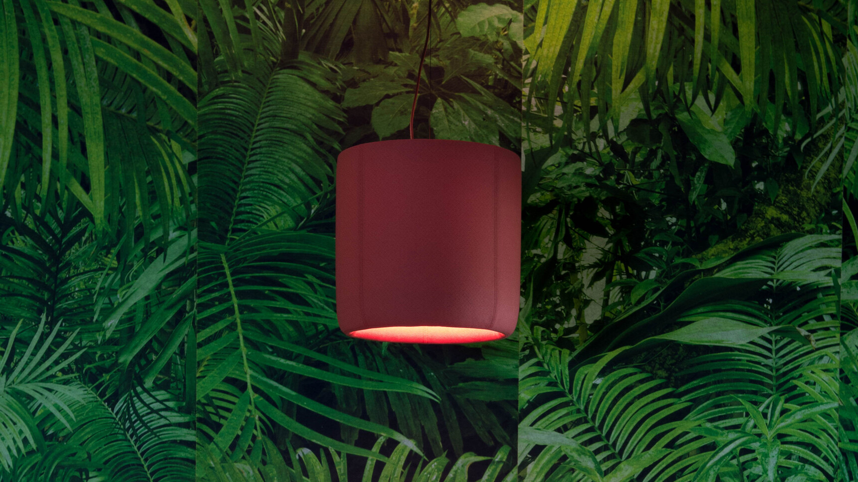 Buzzi Space BuzziProp LED Light With Dark Red Upholstery Detail Image With Tropical Background