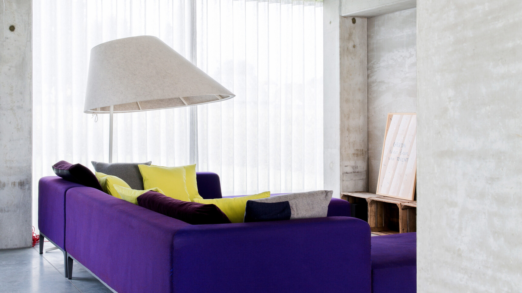 Buzzi Space BuzziShade Floor Standing Lamp With White Finish With Purple Sofa In Home Setting