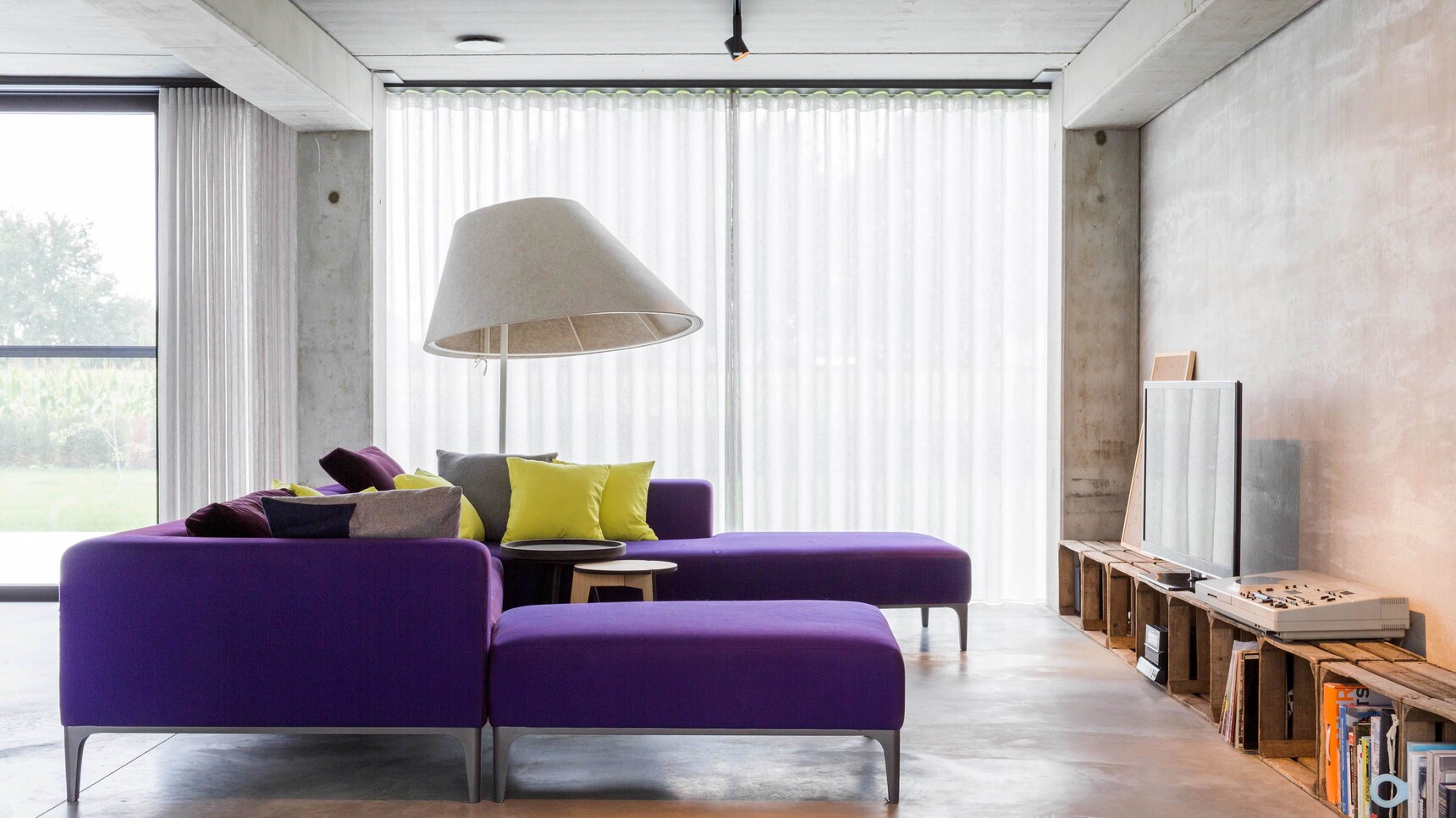 Buzzi Space BuzziShade Floor Standing Lamp With White Finish With Purple Sofa In Home Environment