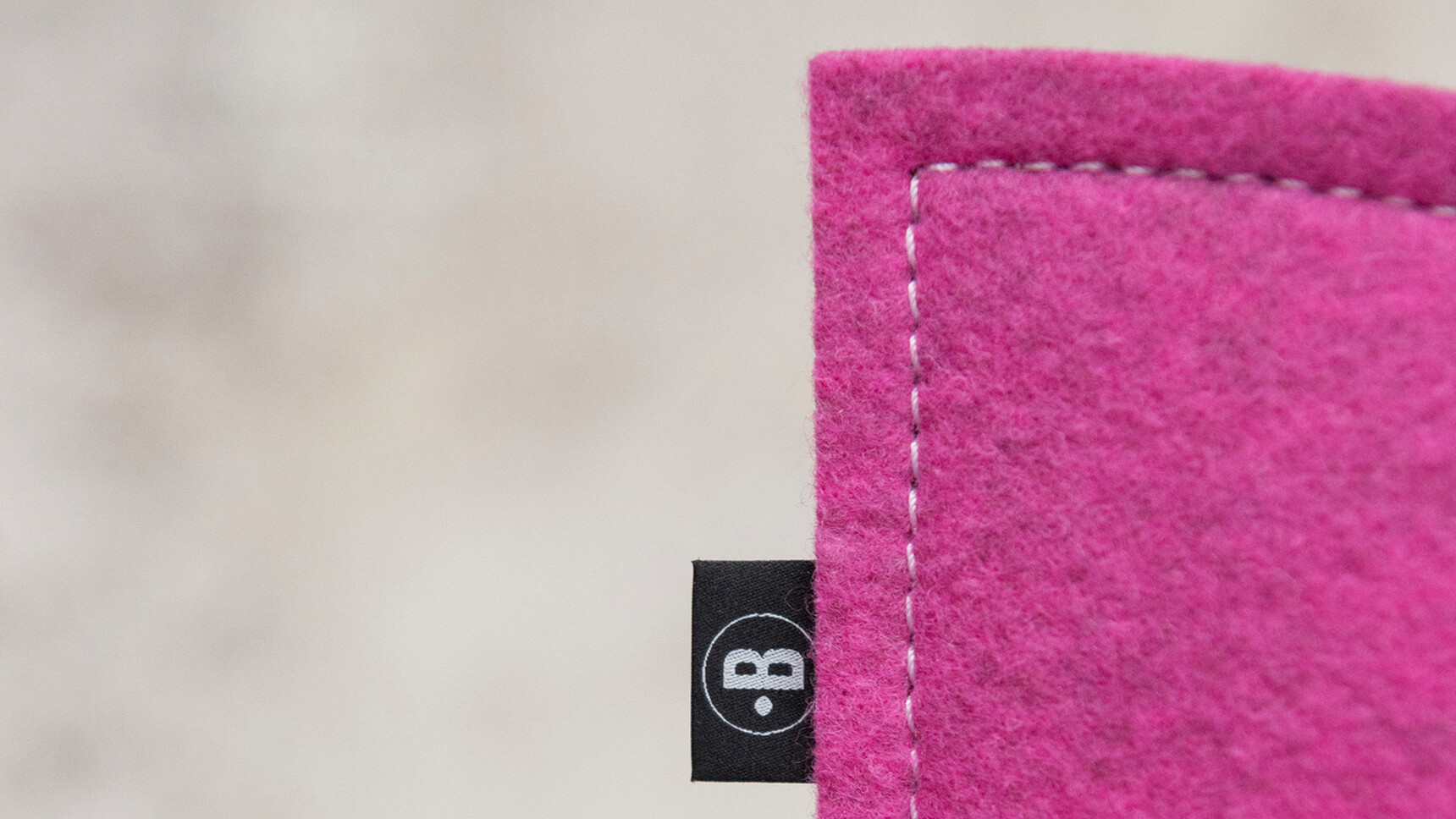 Buzzi Space BuzziBlinds Beach Acoustic Partition With Purple Upholstery Detail Image Focusing On One Partition With Buzzi Label