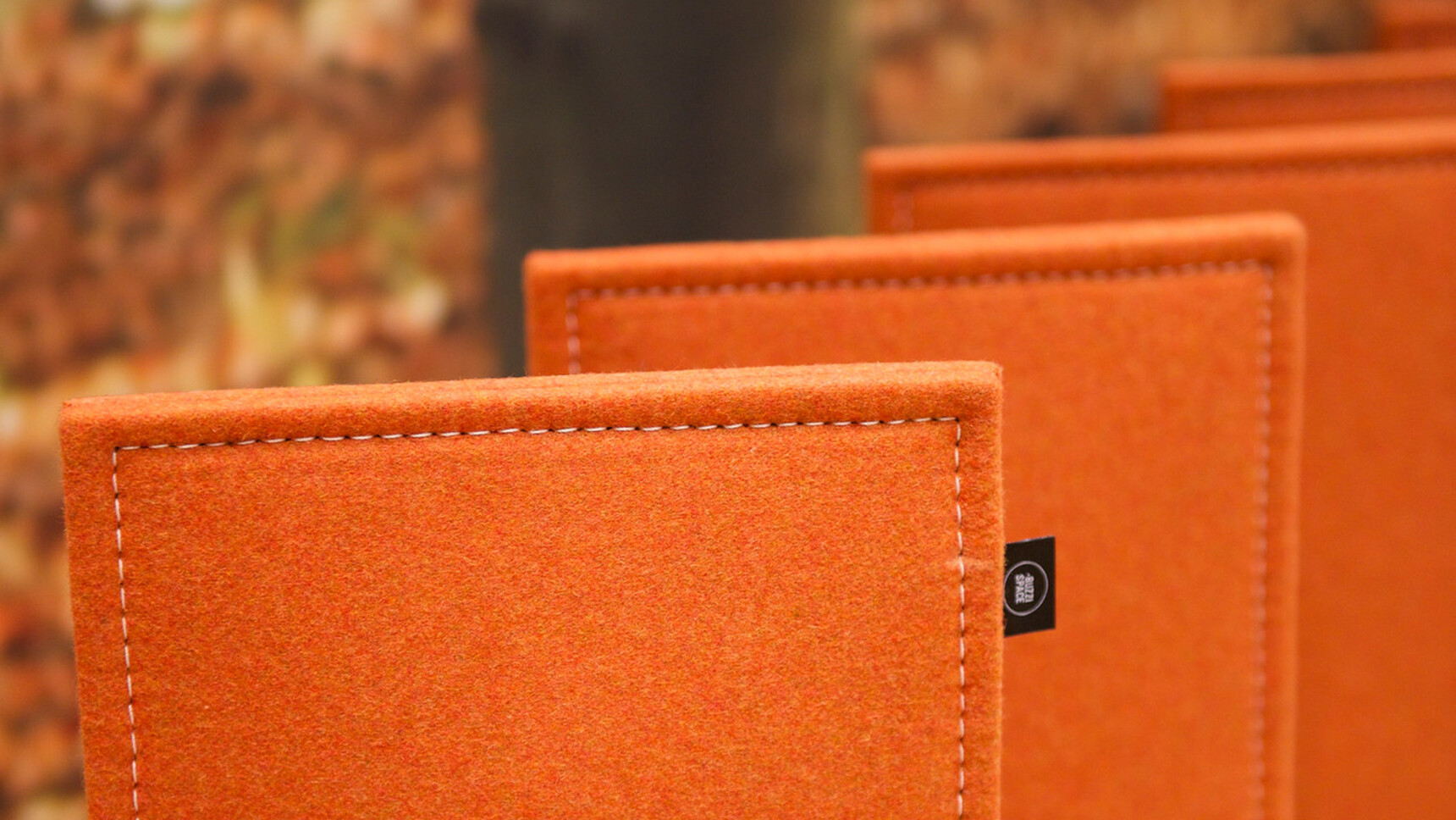 Buzzi Space BuzziBlinds Straight Acoustic Partition In Orange Upholstery Detail Image
