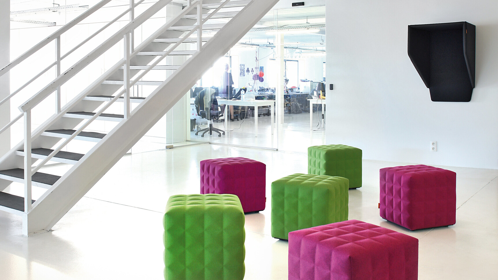 Buzzi Space BuzziHood Acoustic Element In Black Upholstery In Office Setting