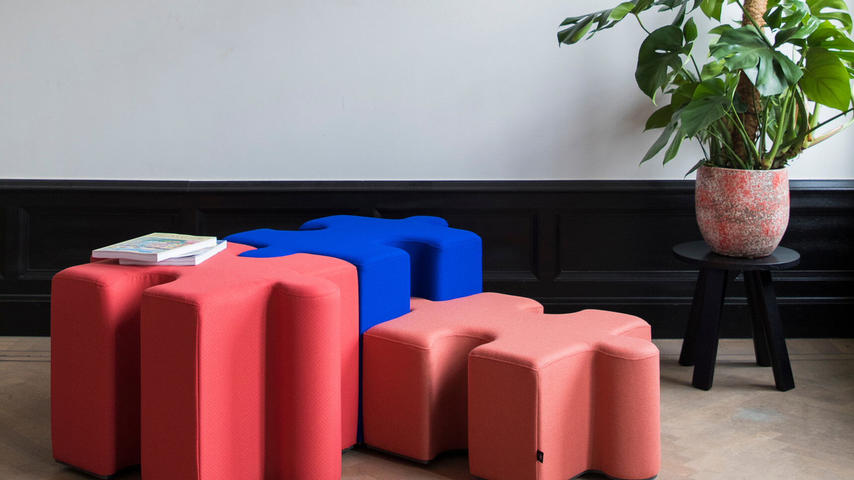 Two Buzzi Space BuzziPuzzle High Acoustic Elements Joined Together With A Low Puzzle Family Image