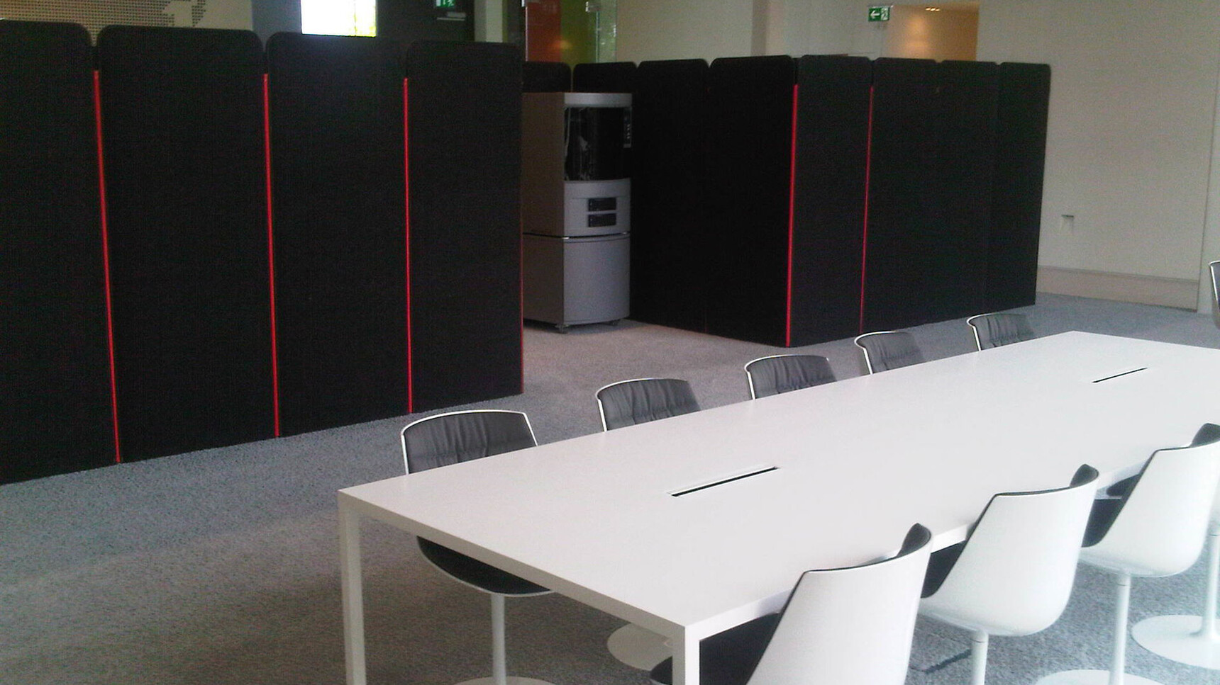 Buzzi Space BuzziScreen Acoustic Partitions In Black Upholstery In Office Setting