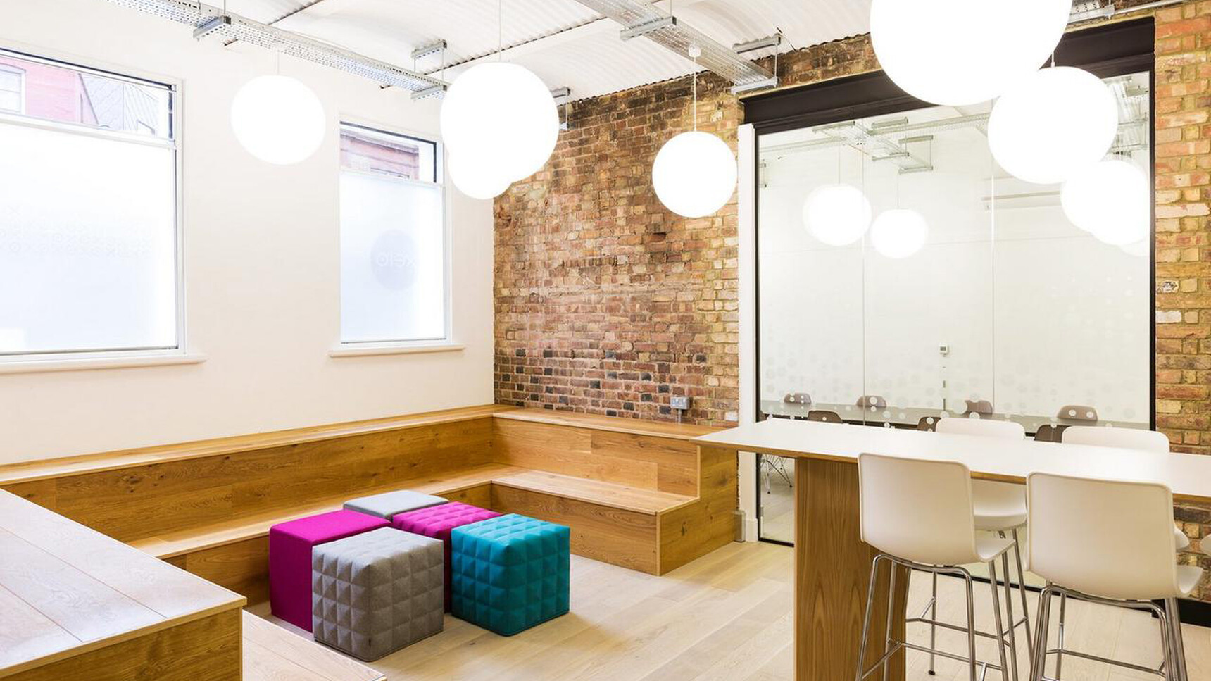 Buzzi Space BuzziCube Flat Pouffe In Pink Upholstery In Office Setting