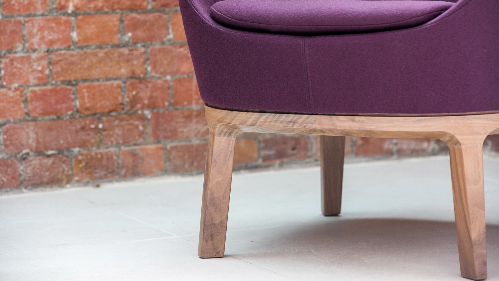 Connection Dixi Low Tub Chair With Wood Base In Purple Upholstery With Wood Base Detail Image