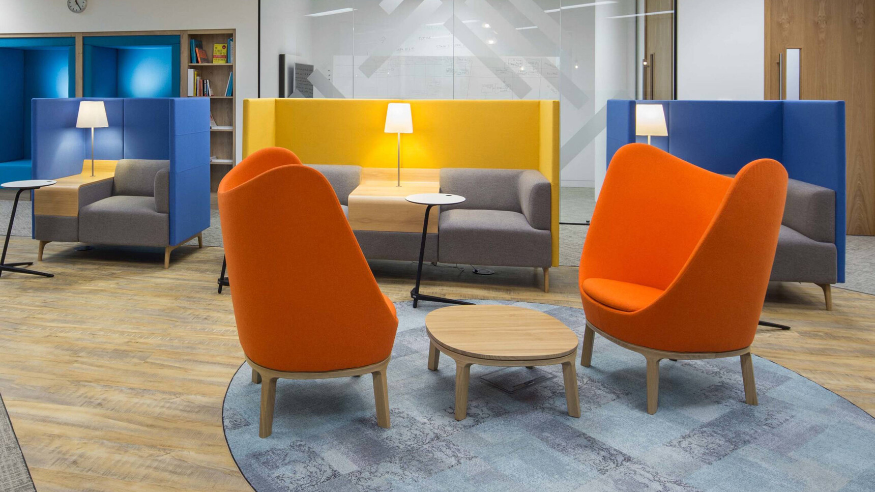Connection Dixi Wing Tub Chairs With Wood Bases In Orange Upholstery At Coffee Table Family Image In Office Setting
