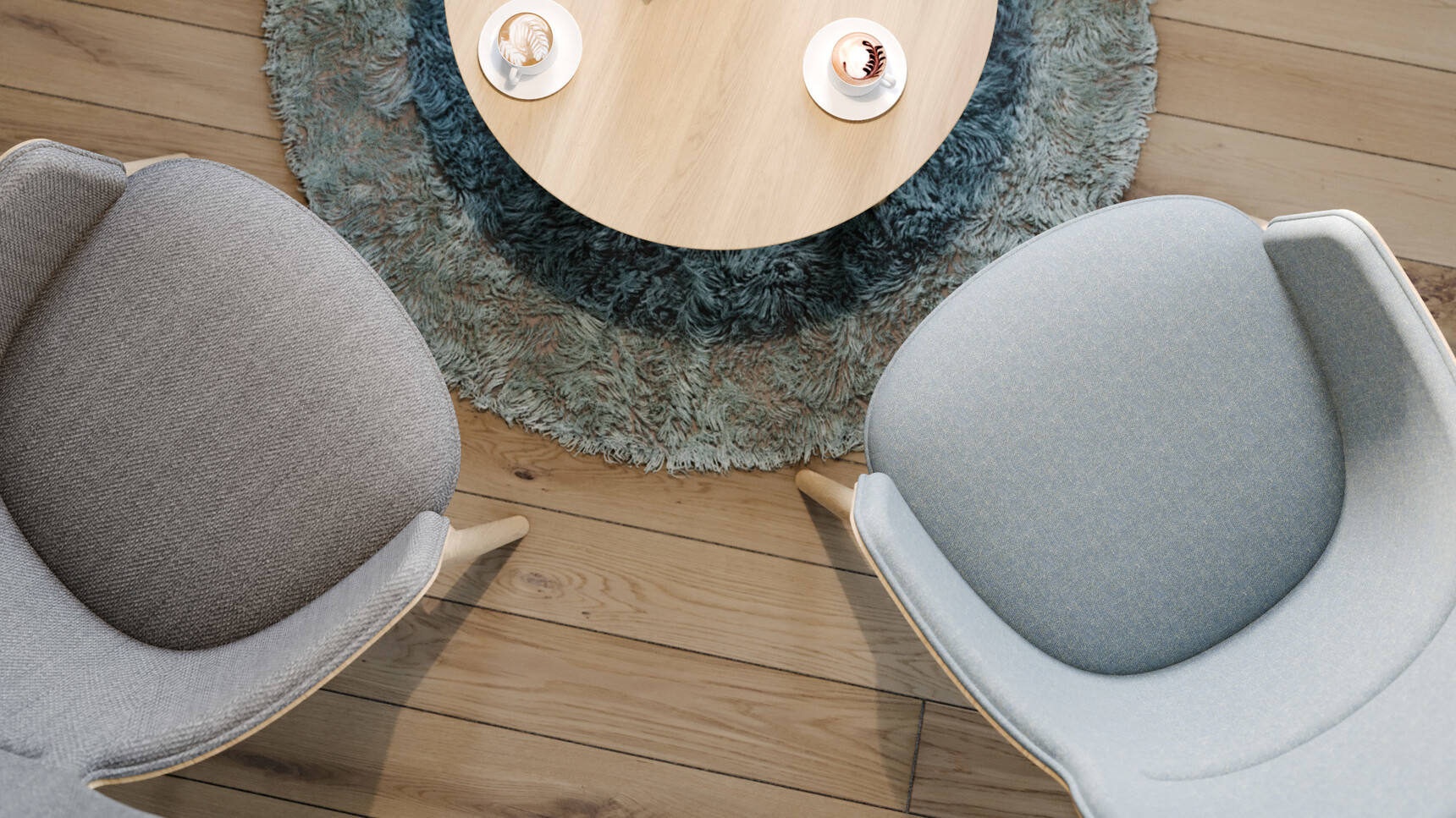 Connection Hygge Lounge Chairs With Grey Fabrics And Wood Bases In Lounge Area Overhead Image