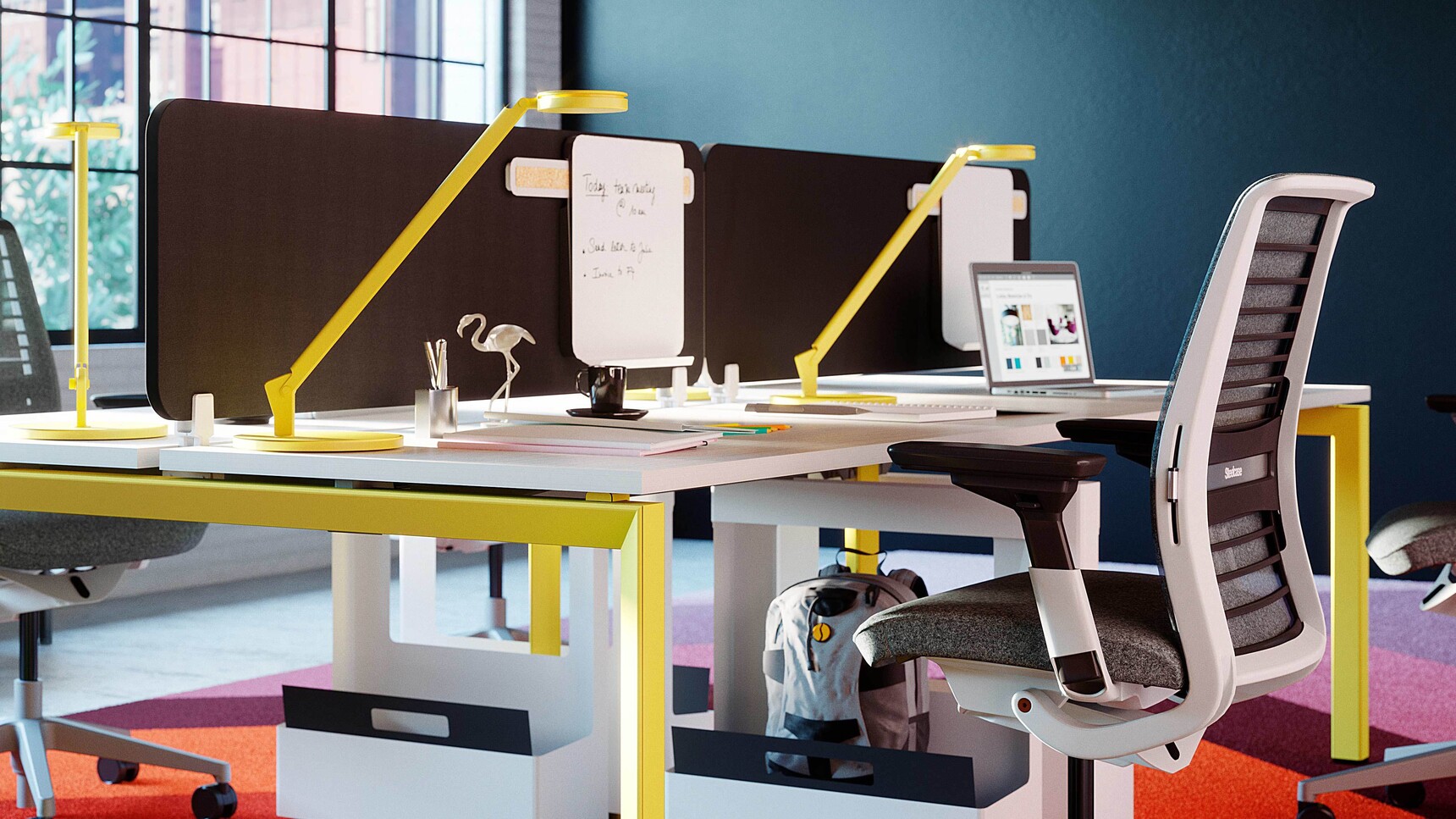 Two Yellow Steelcase Dash Mini Arm LED Light In Yellow Upholstery On Table Detail Image