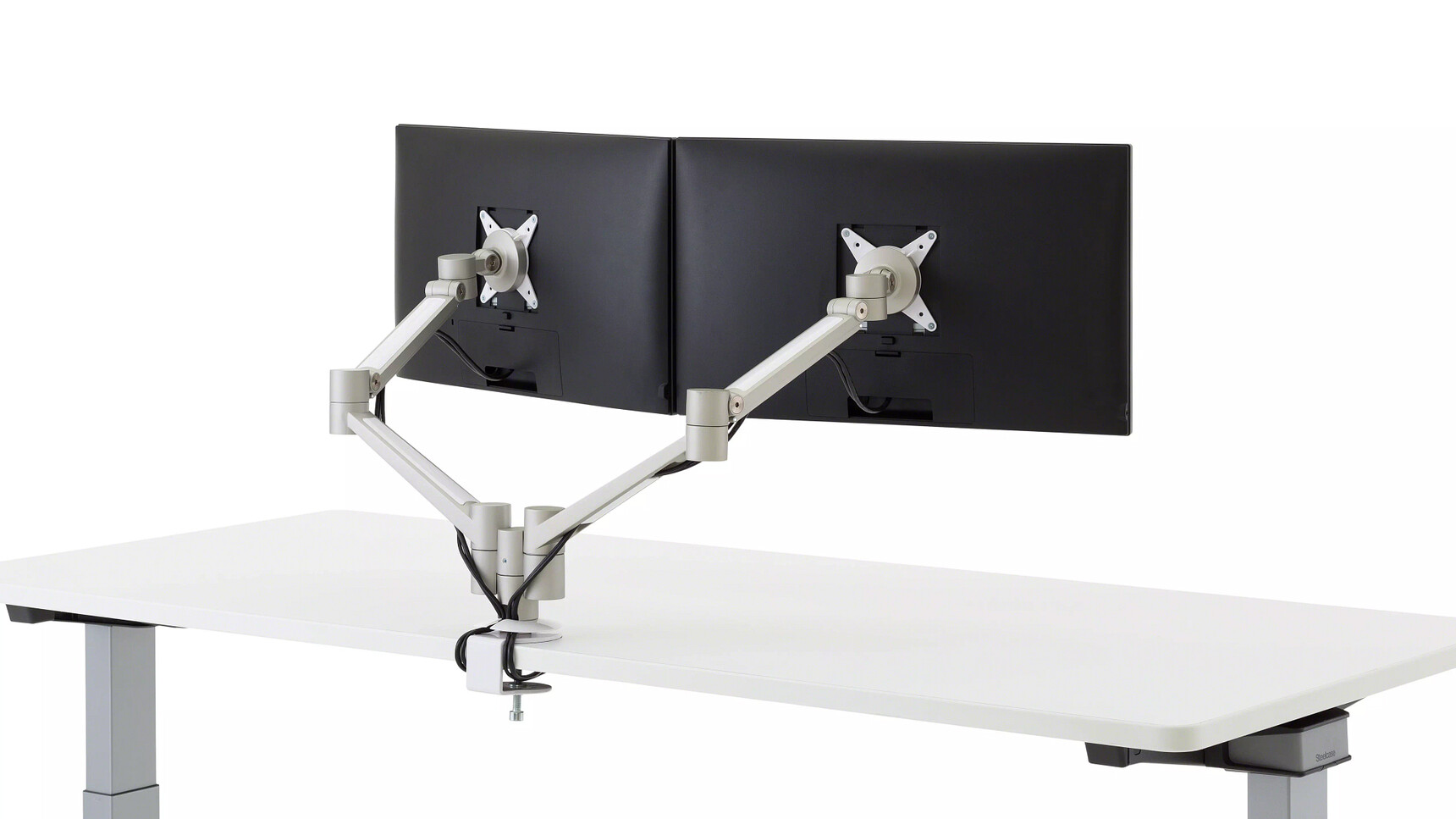 Steelcase Volley Dual Monitor Arm Attached To Table With Cables Family Image
