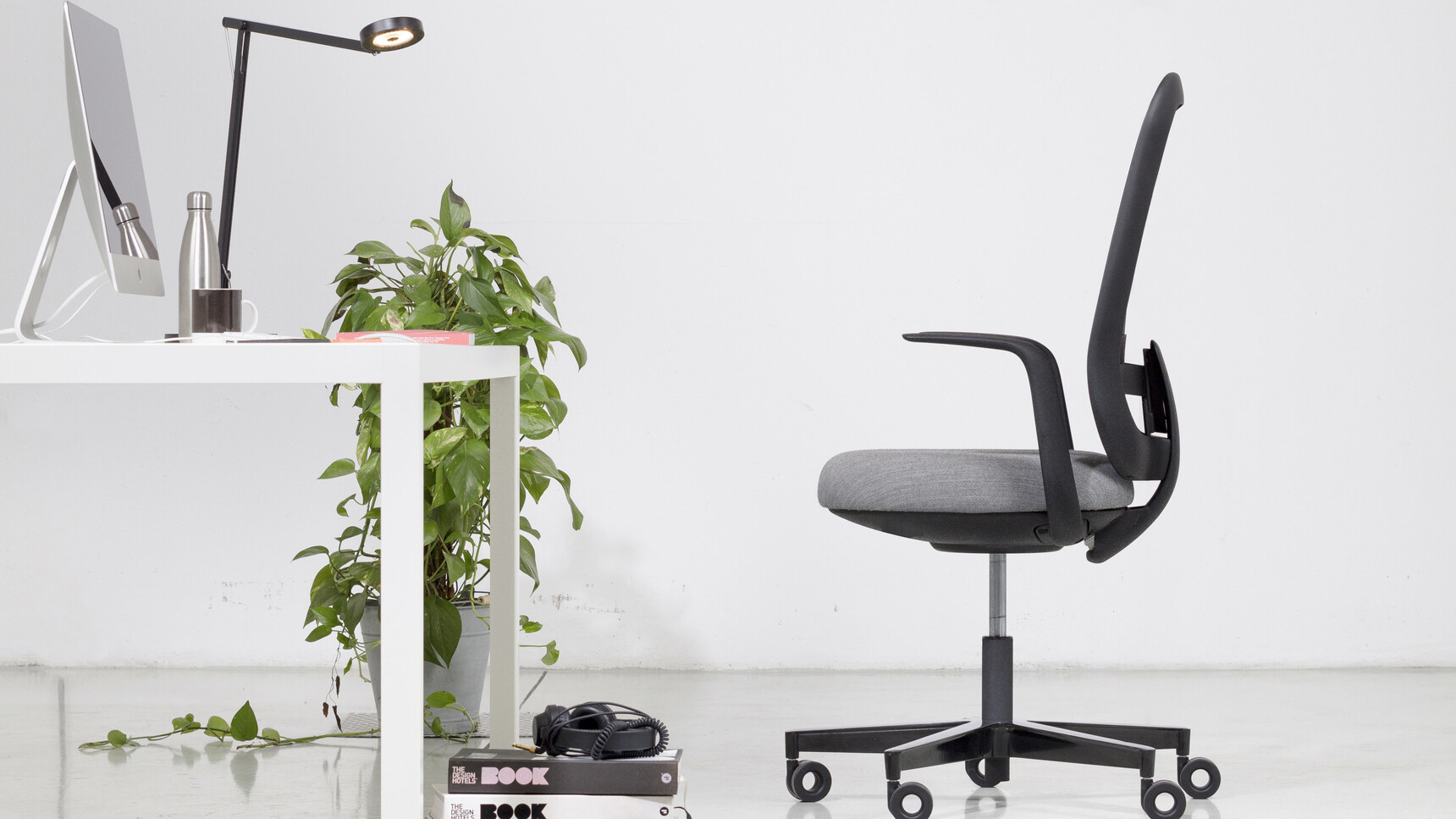Sitland Skate Mesh Task Chair With Fixed Arms Family Image At Desk