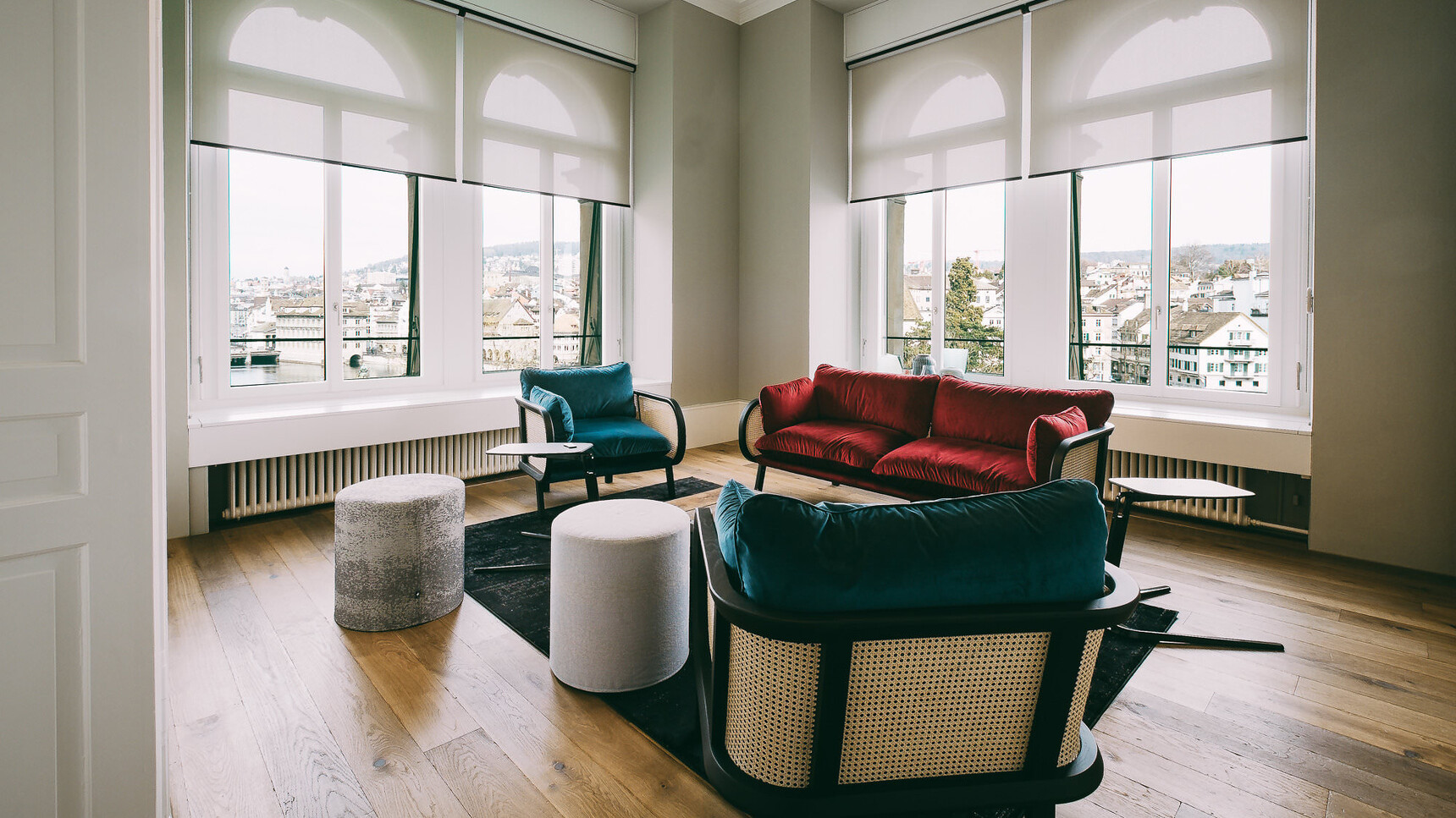 BuzziSpace BuzziSpot Acoustic Round Pouffes In Lounge Setting