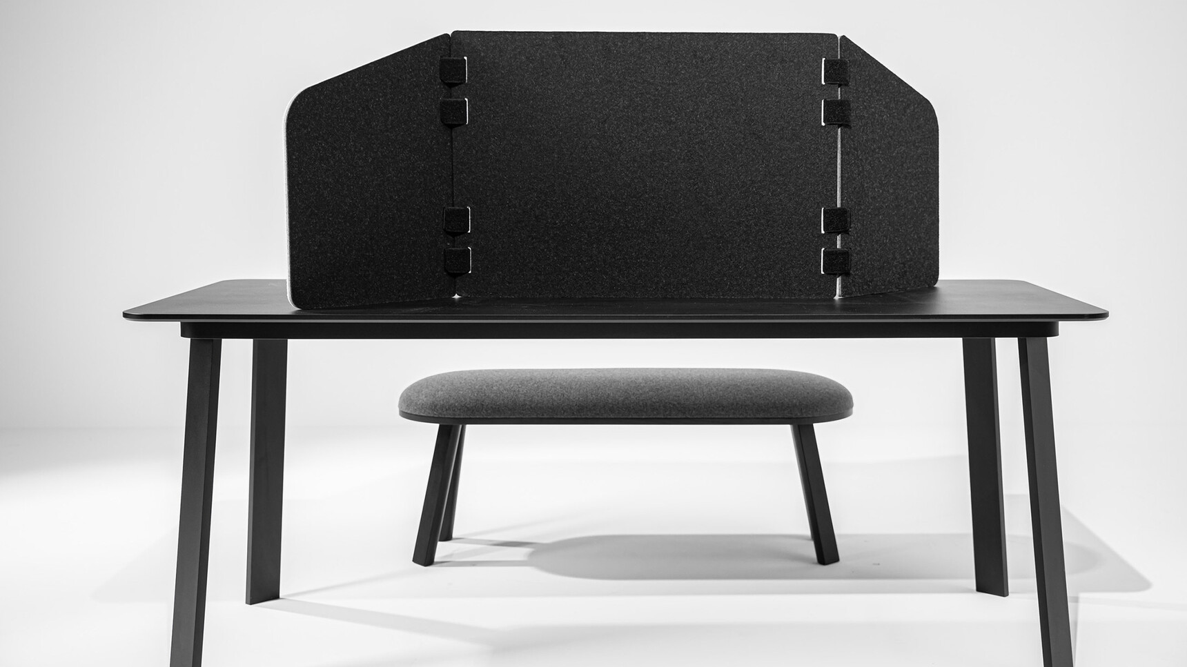 Buzzi Space BuzziTripl Home Low Showing Black Upholstery On Table Family Image