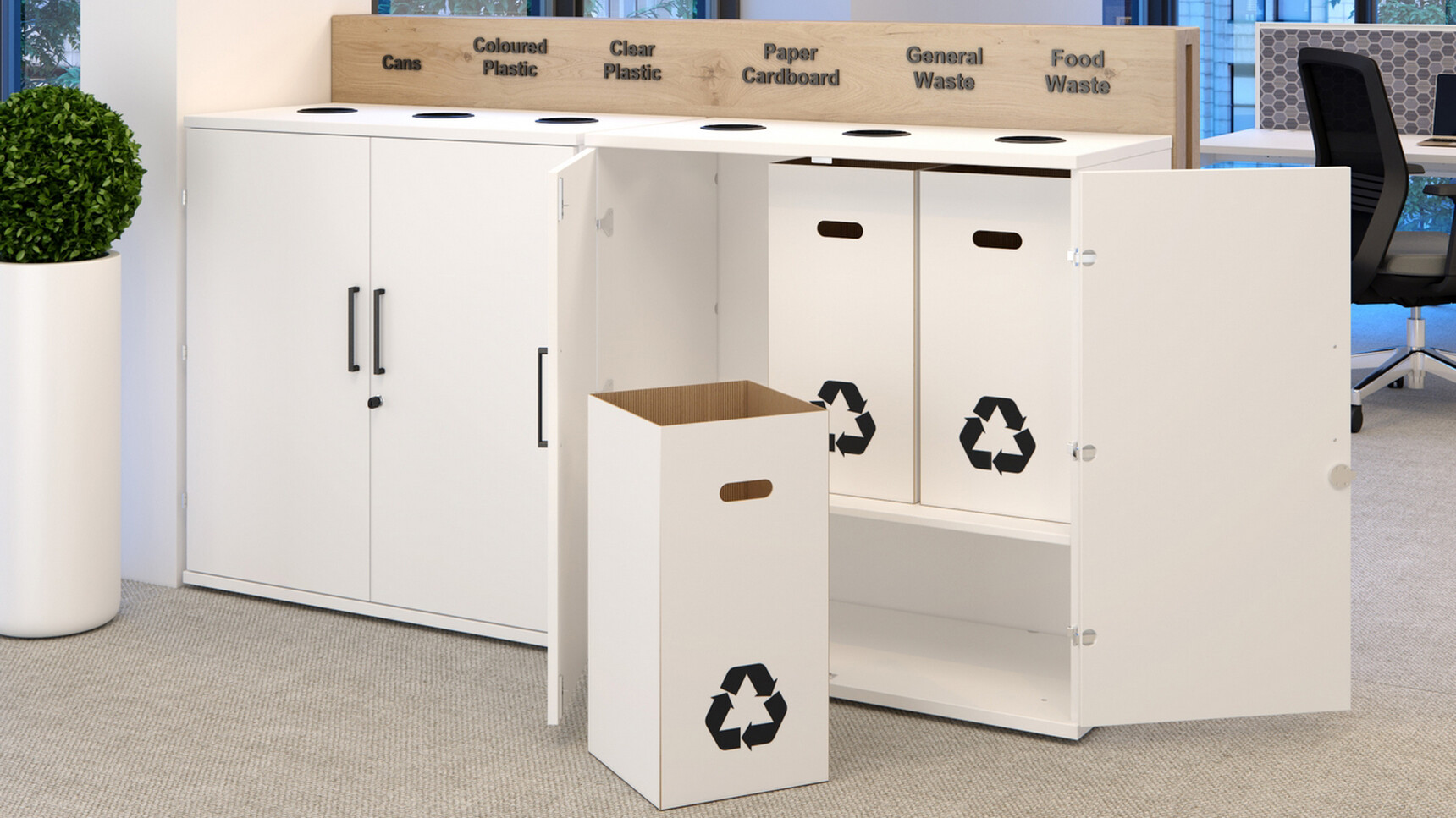 Two Elite Recycling Units with Three Sections With White Finish One Open With One Bin On The Floor One Closed In Office Environment