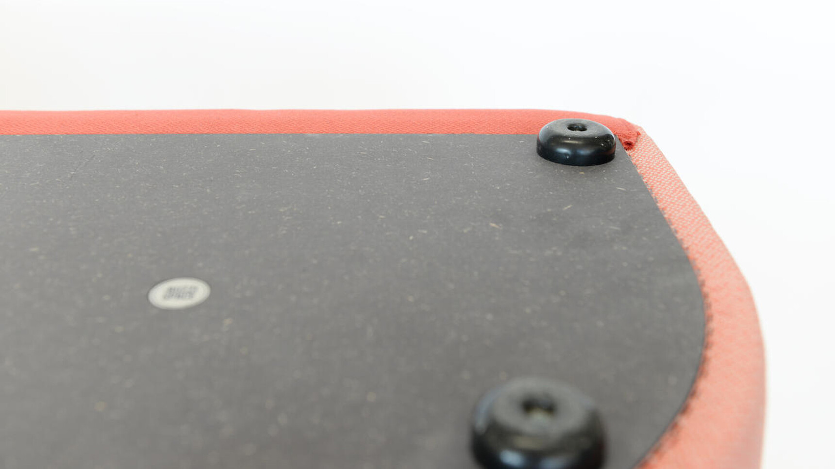 Buzzi Space BuzziDee Solo Pouffe 3D Rib Side Orange Upholstery Detail Image Showing Wood Base