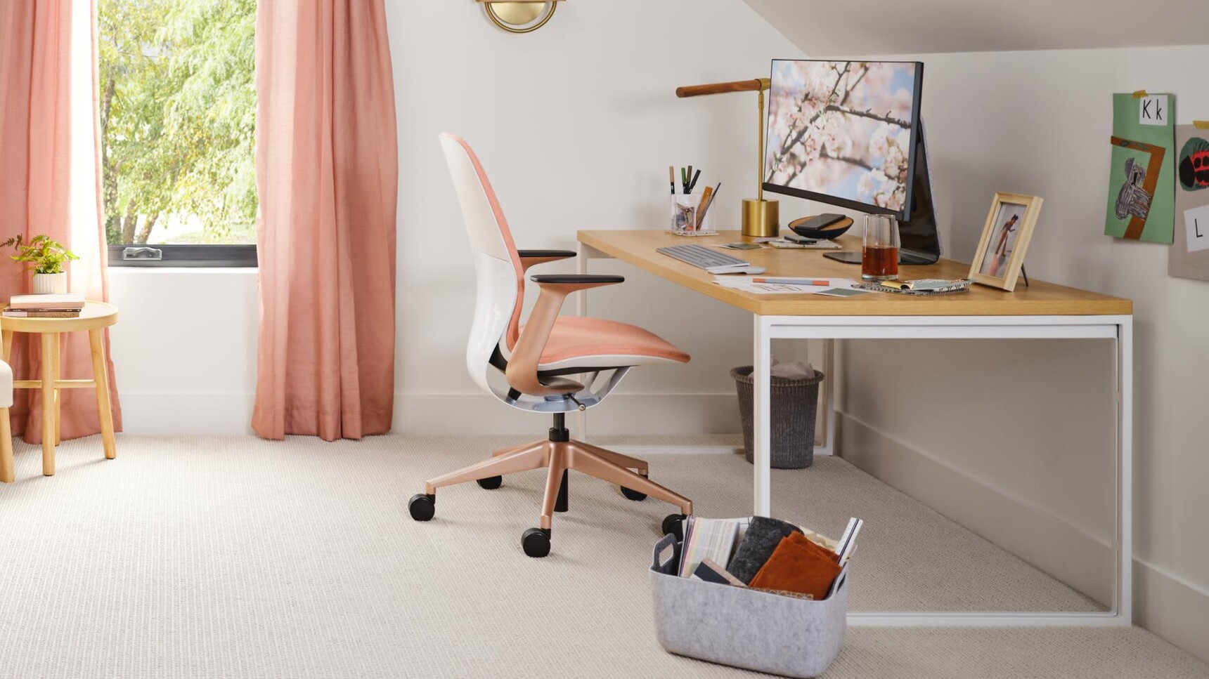 Steelcase SilQ Upholstered Office Chair At Desk Family Image