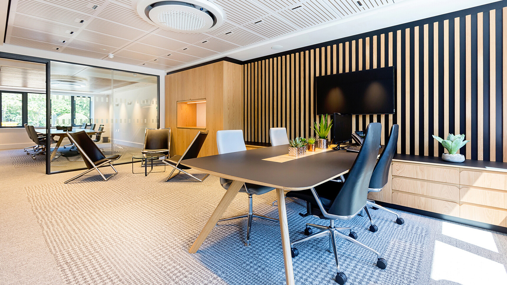 William Hands Vantage L-shaped Executive Desk With Return Black Top Wood Legs In Office Setting