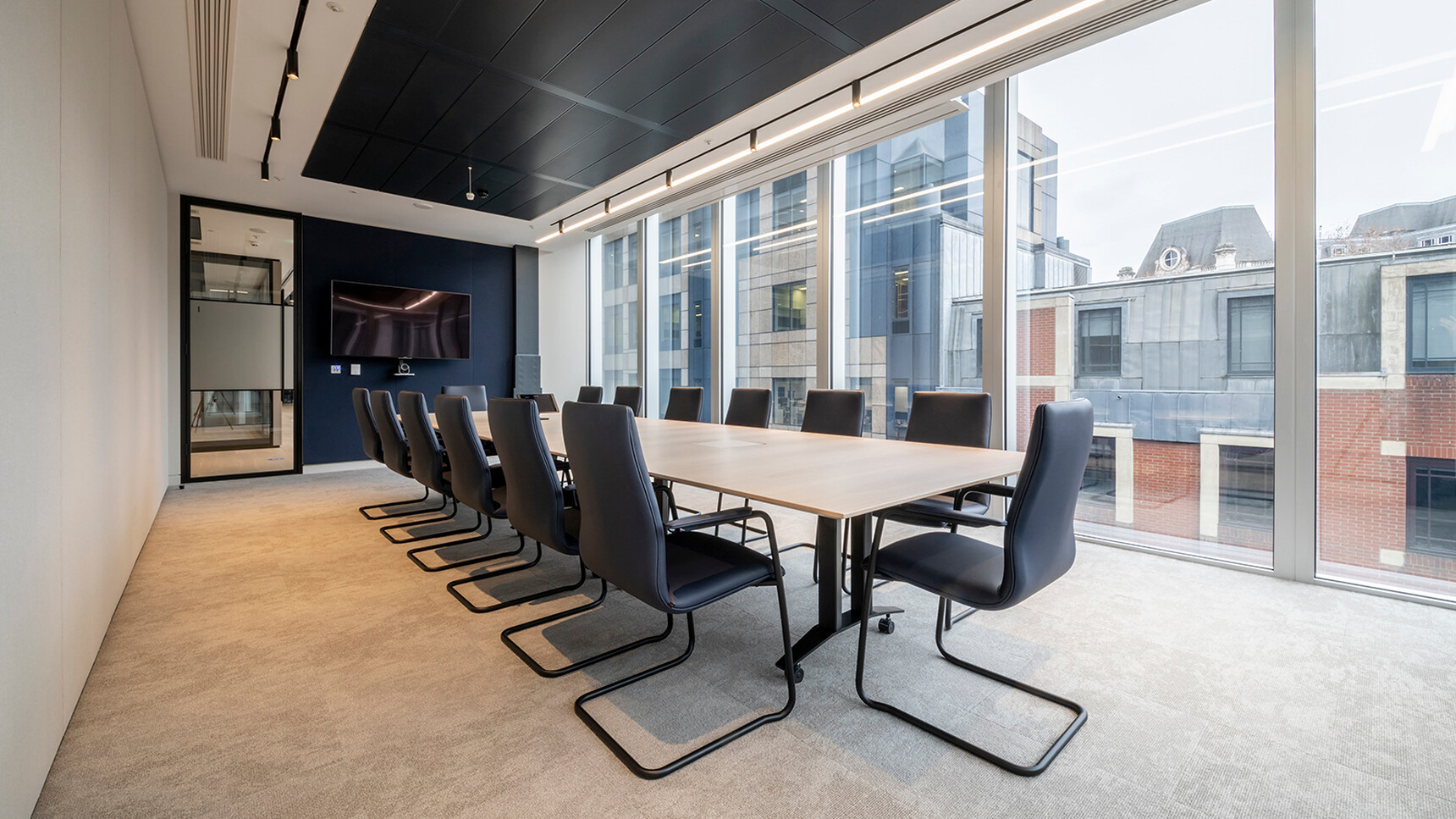 William Hands Cypher 810 Medium Back Meeting Chair Black Cantilever Base In Office Setting