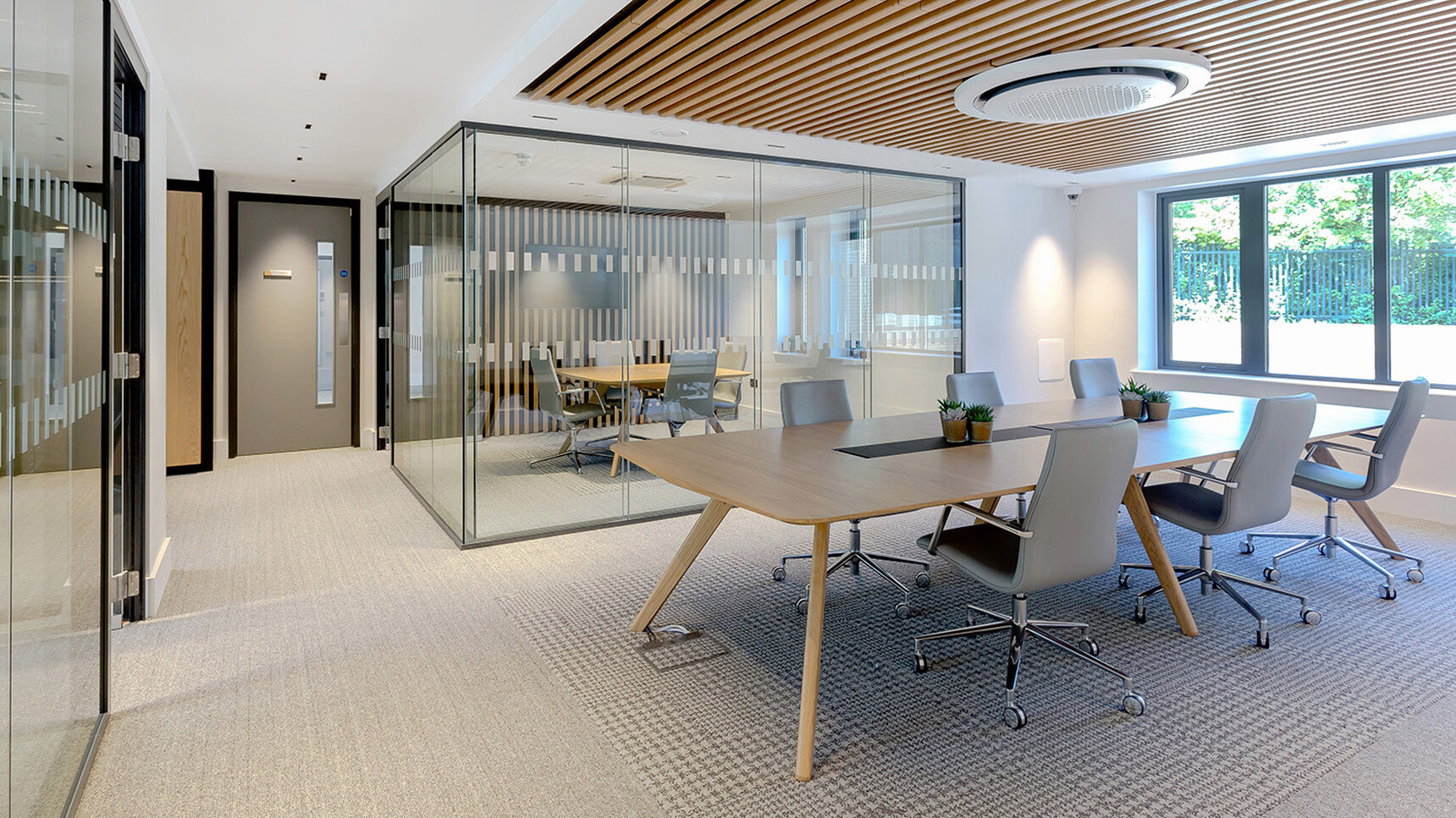 William Hands Cypher 853 Medium Back Office Chair Tech Arm At Table In Office Setting