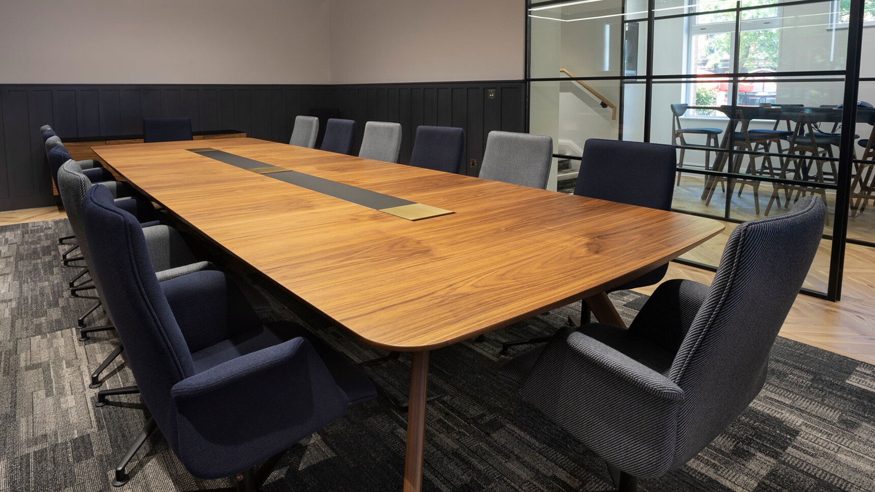 William Hands Cypher 841 Medium Back Office Chairs With Four Star Base Wing Arms At Table In Conference Room