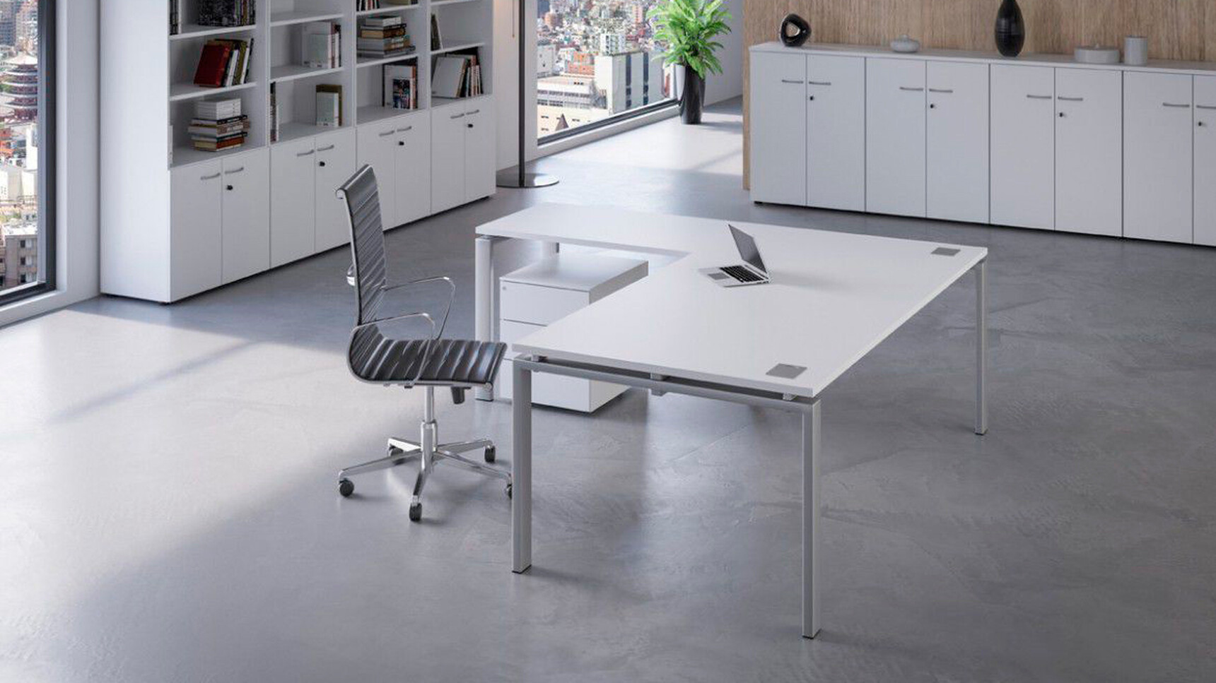 Buronomic Astro L-shaped Executive Desk With Return White Top With Chair At Desk In Office Setting